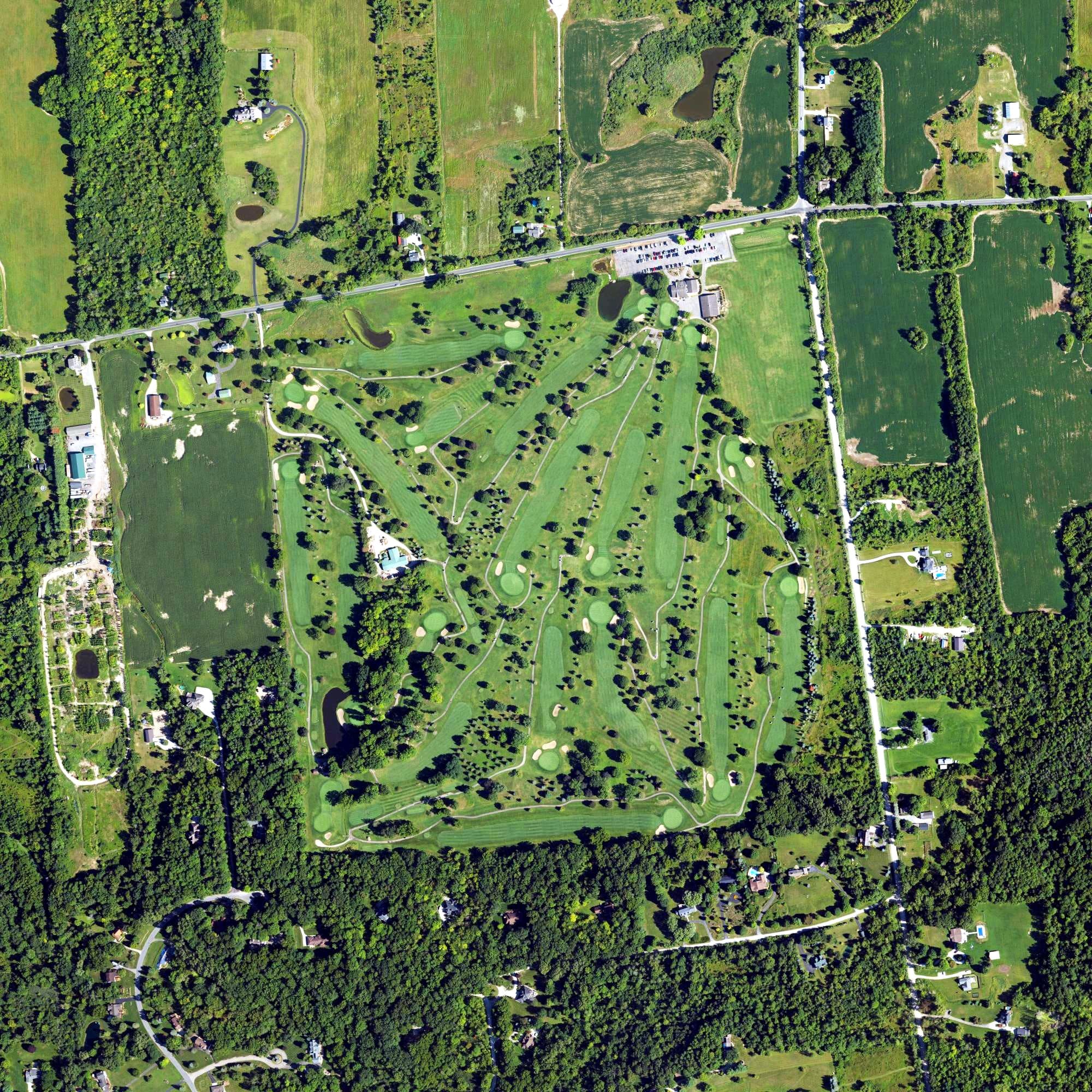 Aerial view of Salem Hills Golf Club, MI, with its hole routing marked