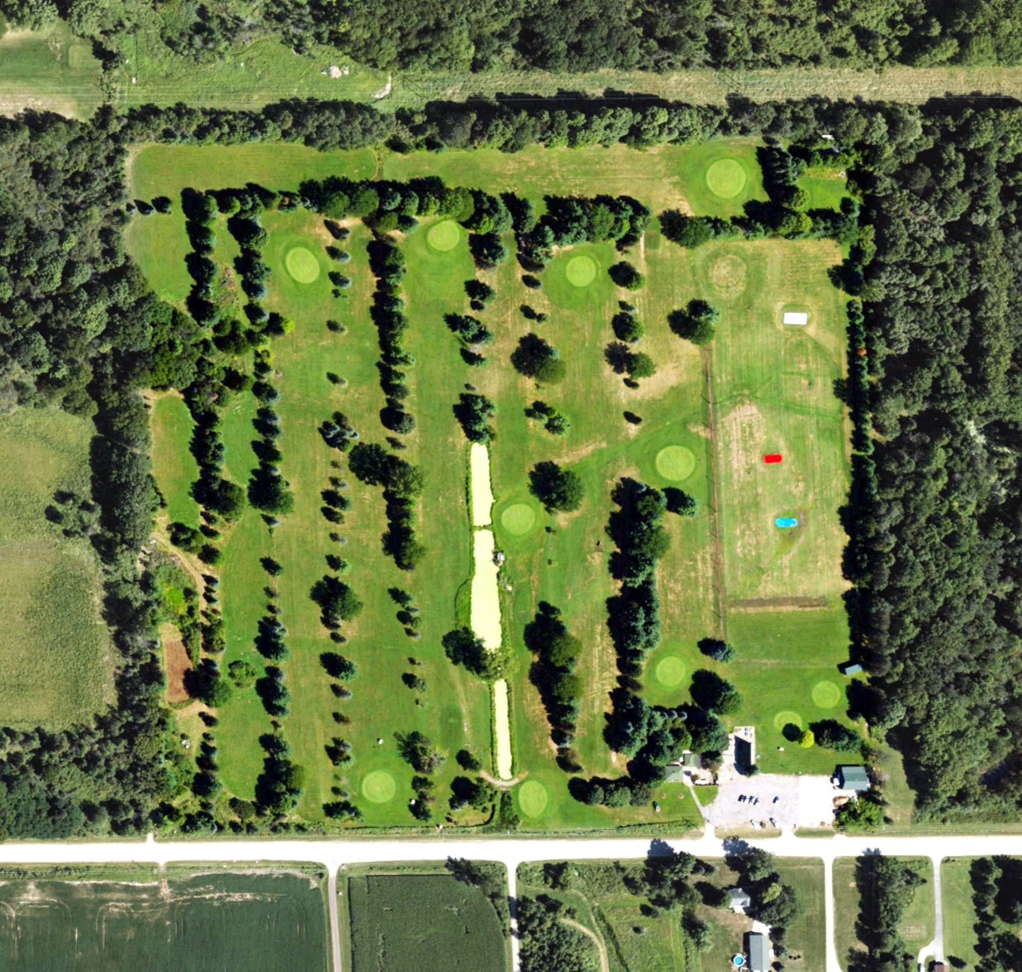 Aerial view of Sand Creek Golf Club, MI, with its hole routing marked