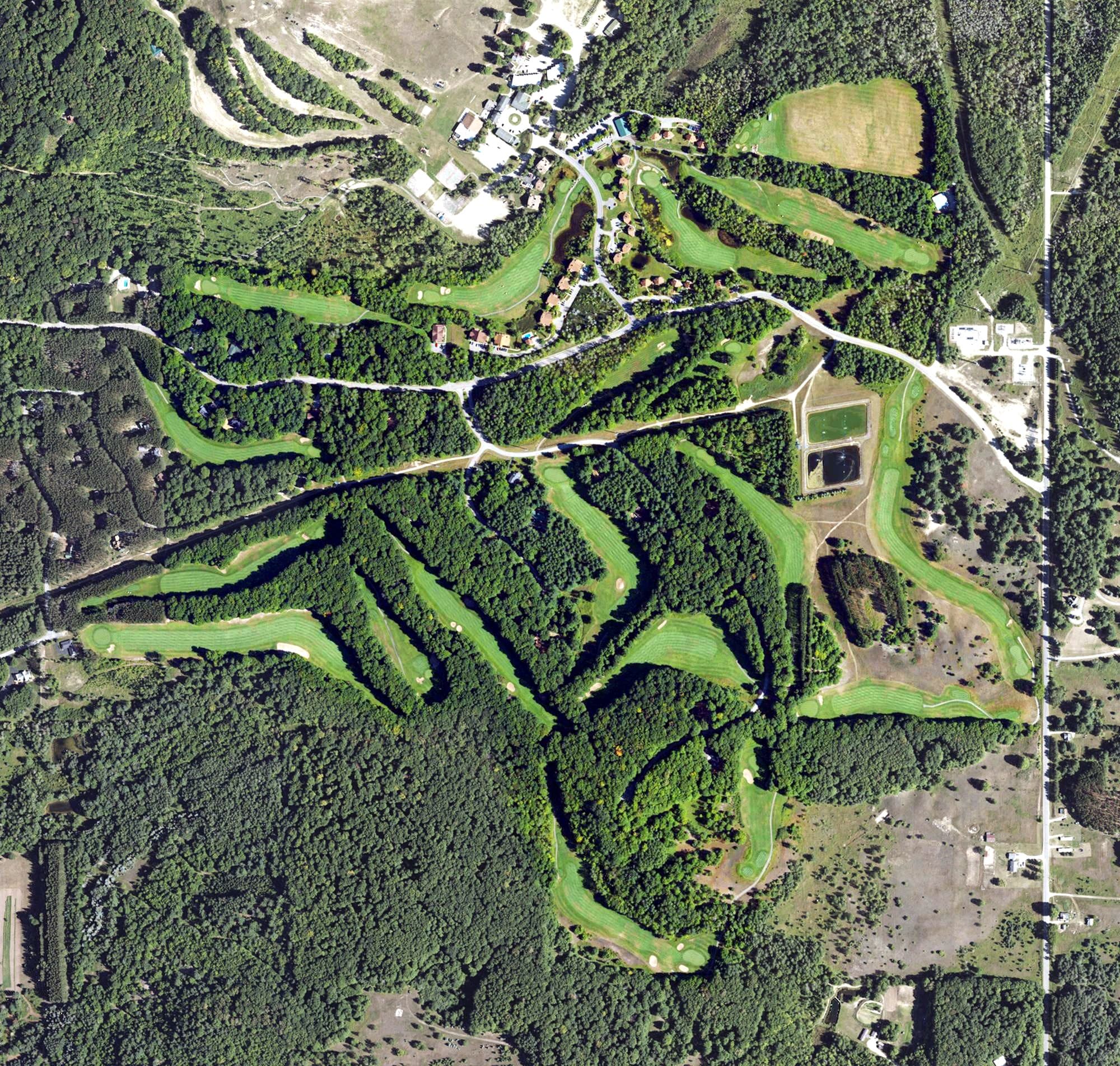 Aerial view of Schuss Mountain Golf Course, MI, with its hole routing marked