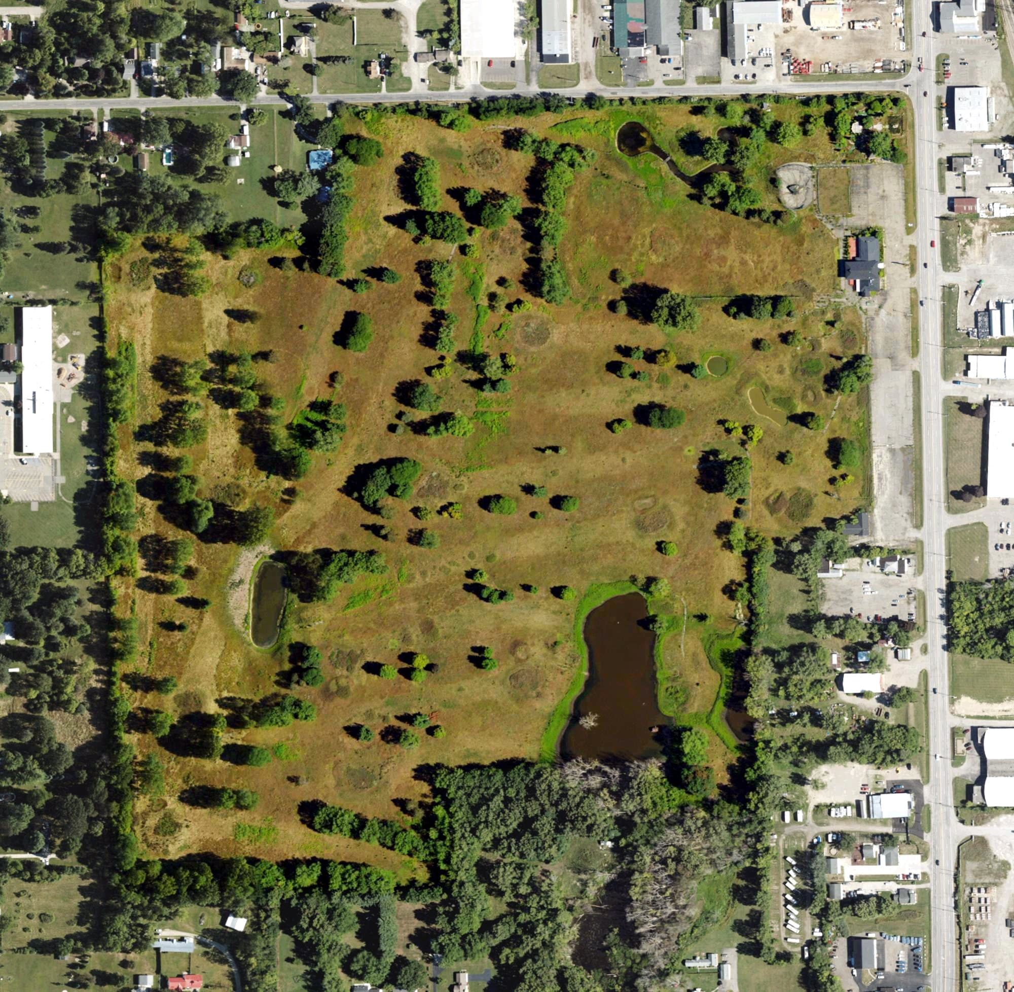 Aerial view of Southmoor Golf Course (former), MI, with its hole routing marked