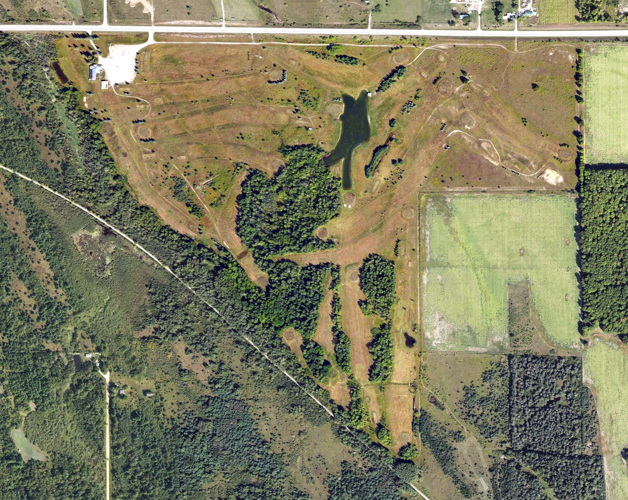 Aerial view of Stoney Links Golf Course (closed), MI, with its hole routing marked