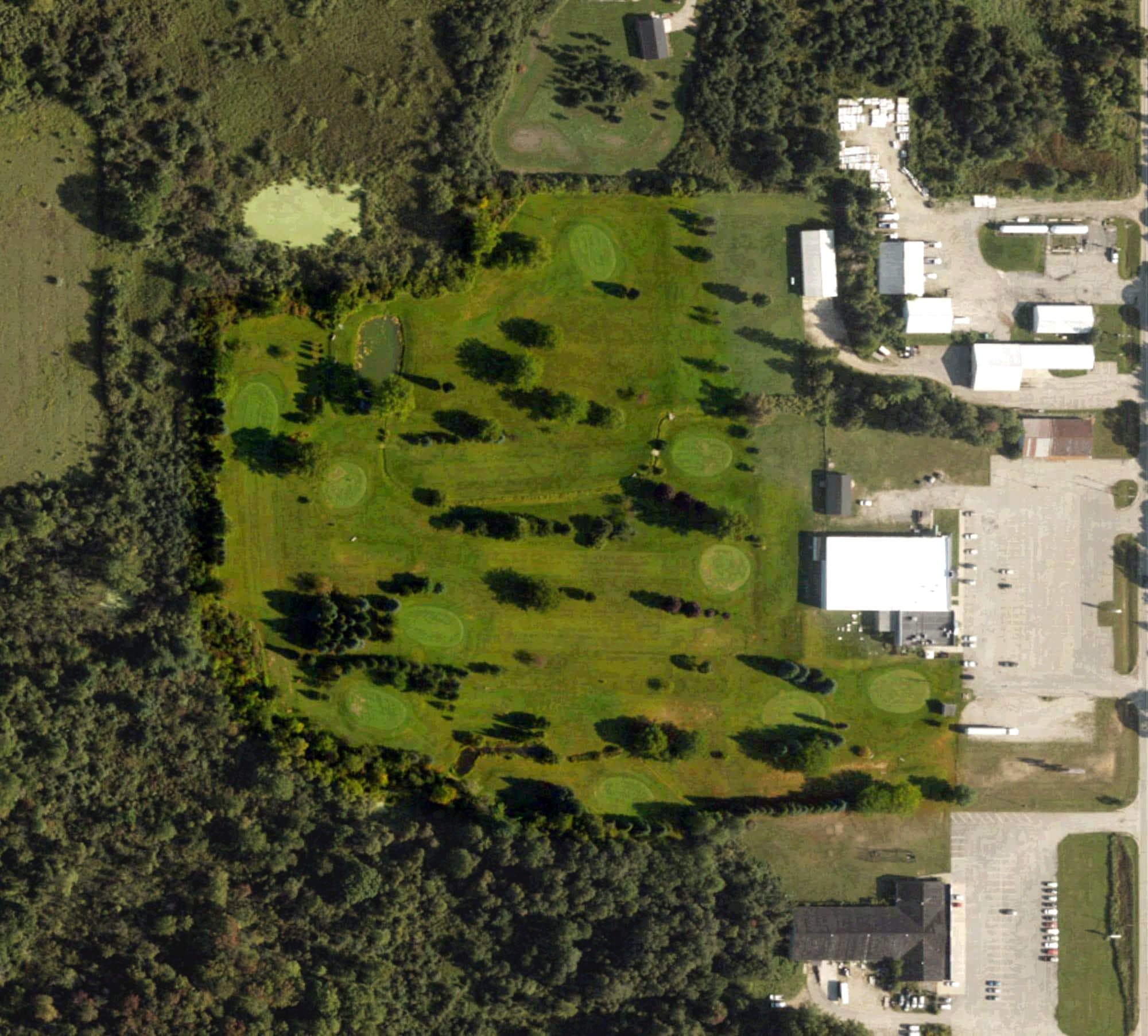 Aerial view of Summer Breeze Par Three Golf Course, MI, with its hole routing marked