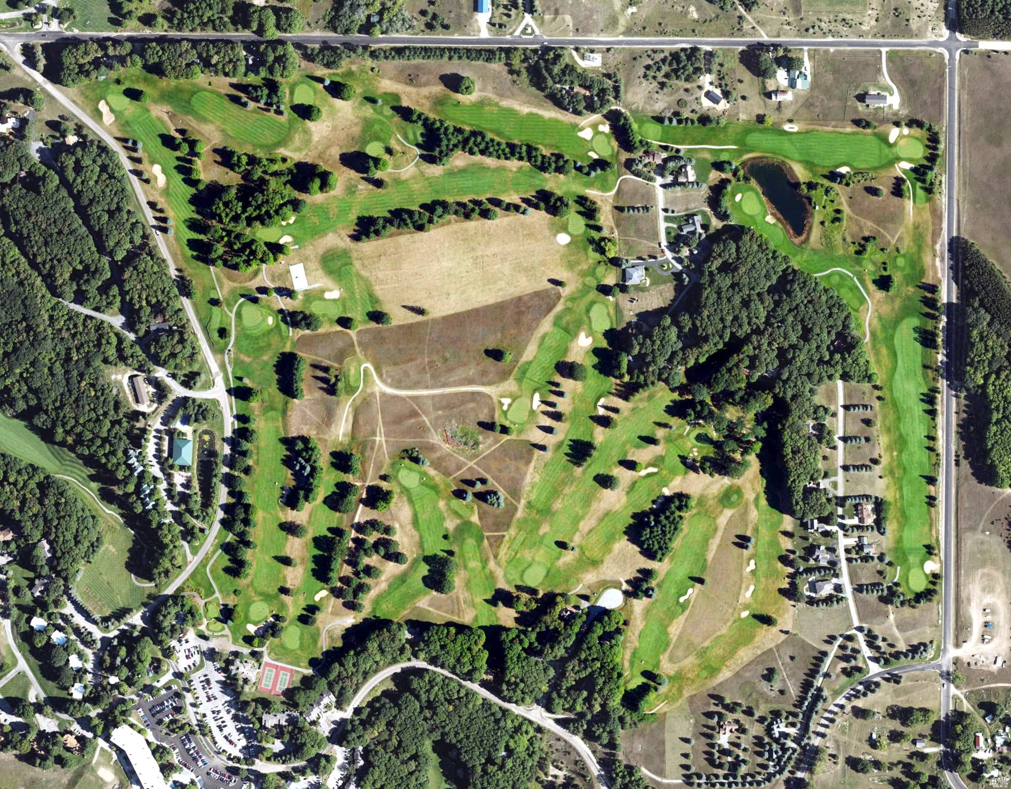 Aerial view of Summit Golf Course, MI, with its hole routing marked