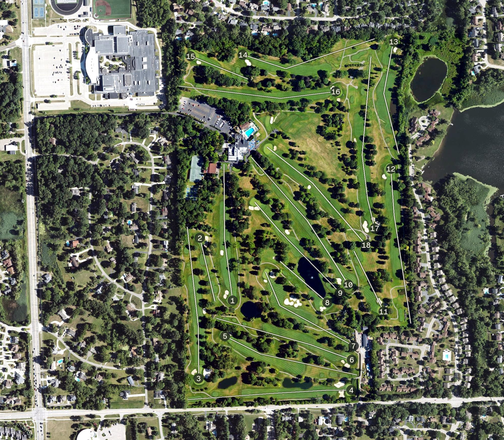 Aerial view of Tam O'Shanter Country Club, MI, with its hole routing marked