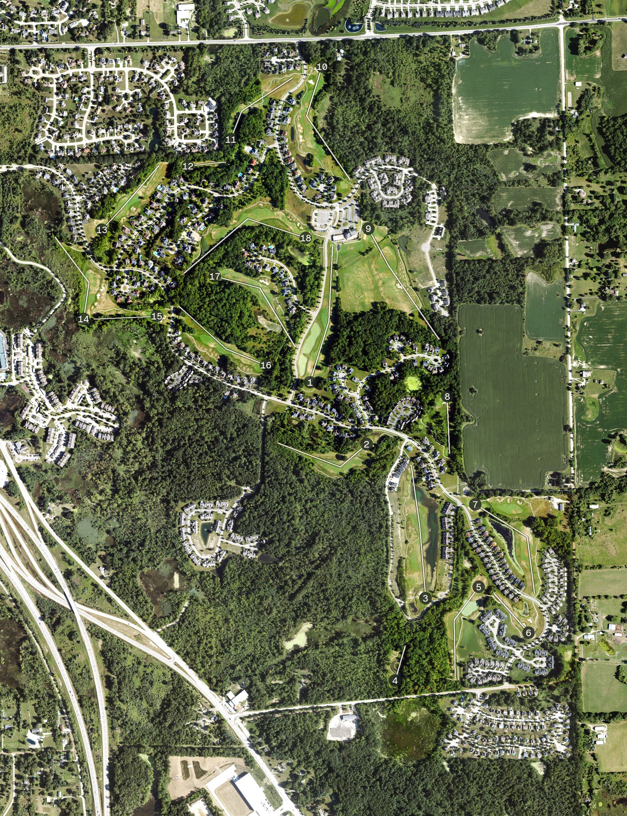 Aerial view of The Captain's Club at Woodfield, MI, with its hole routing marked