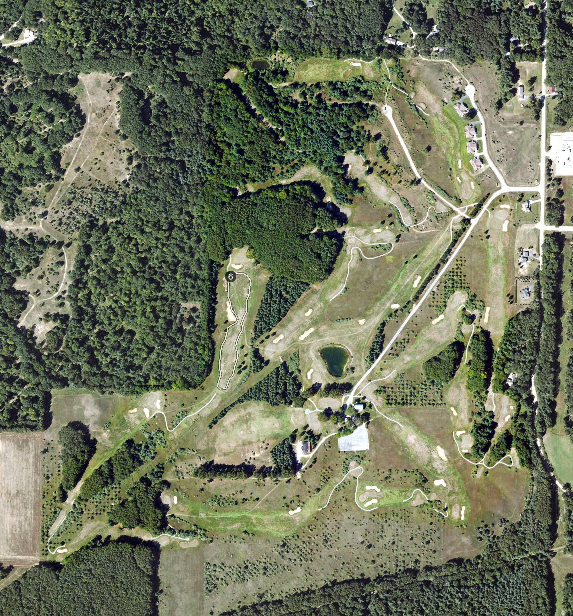 Aerial view of The Heathlands, MI, with its hole routing marked
