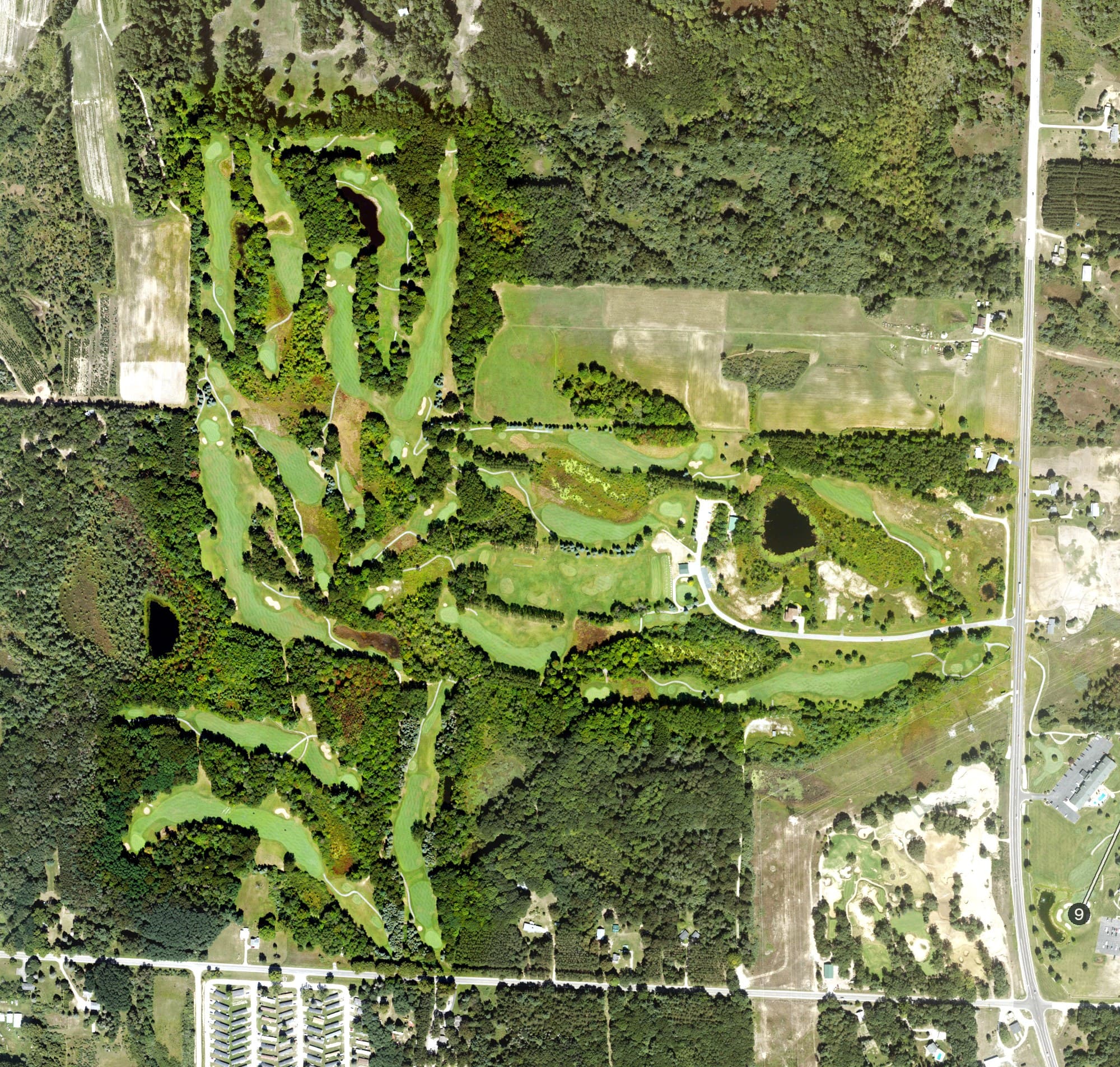 Aerial view of The Revenge, MI, with its hole routing marked
