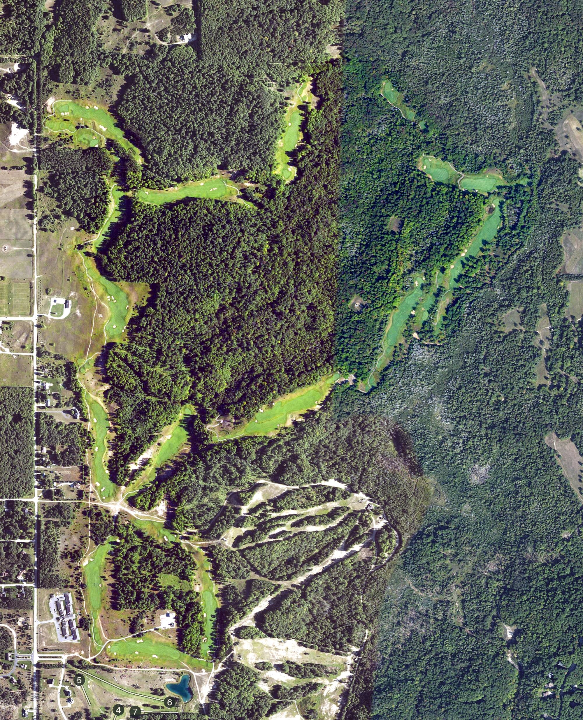 Aerial view of The Tribute, MI, with its hole routing marked