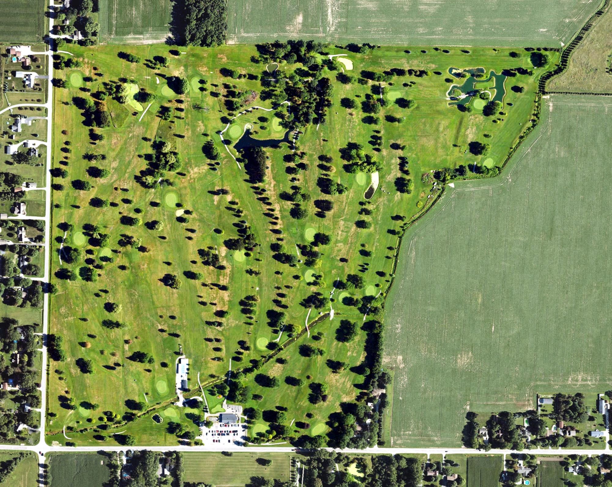 Aerial view of Twin Oaks Golf Club, MI, with its hole routing marked