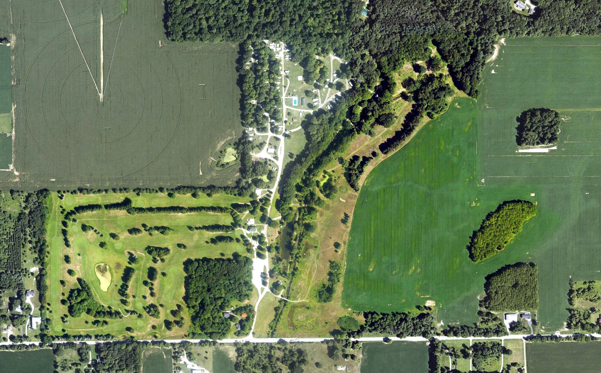 Aerial view of Tyler Creek Golf Club, MI, with its hole routing marked