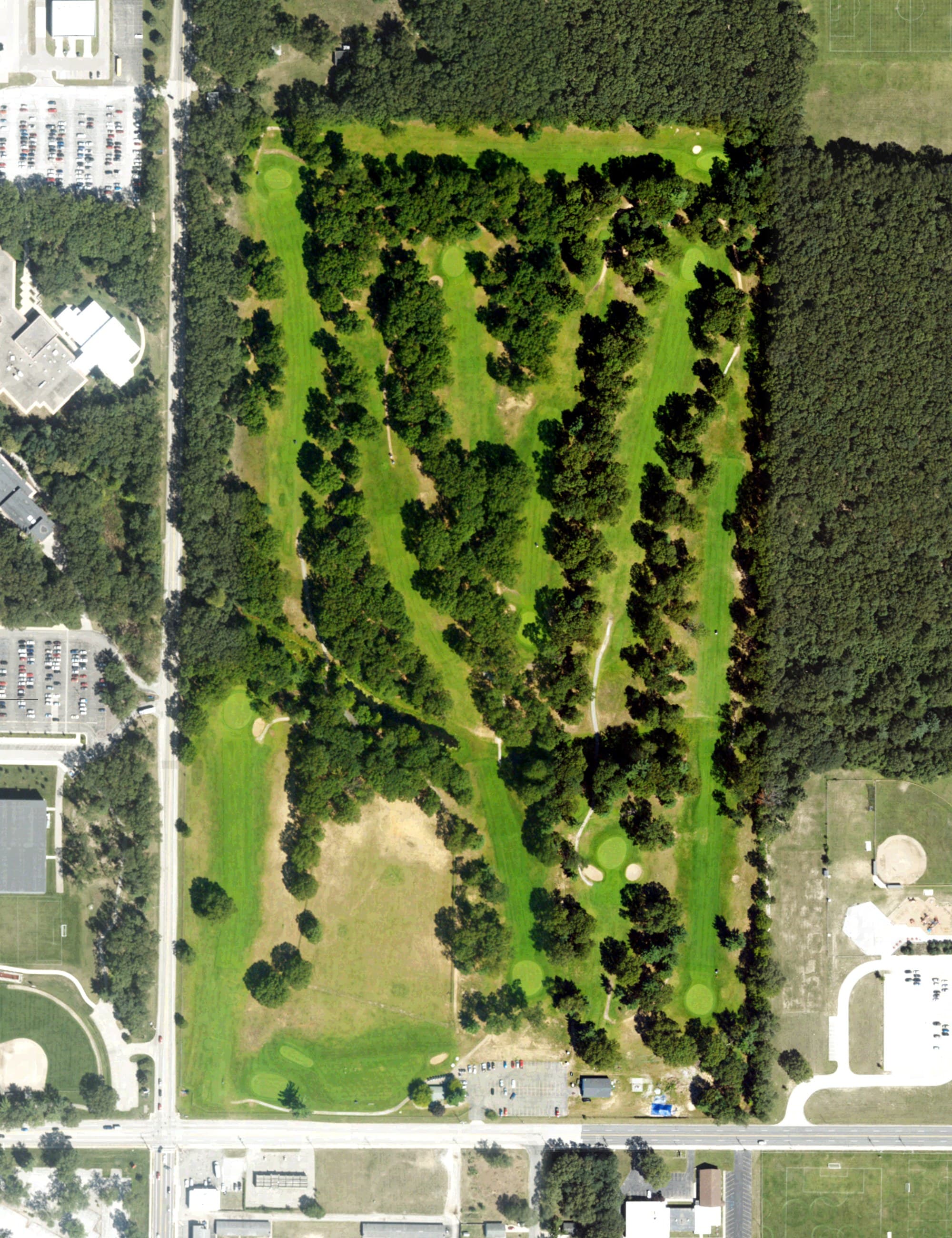 Aerial view of University Park Golf Course, MI, with its hole routing marked