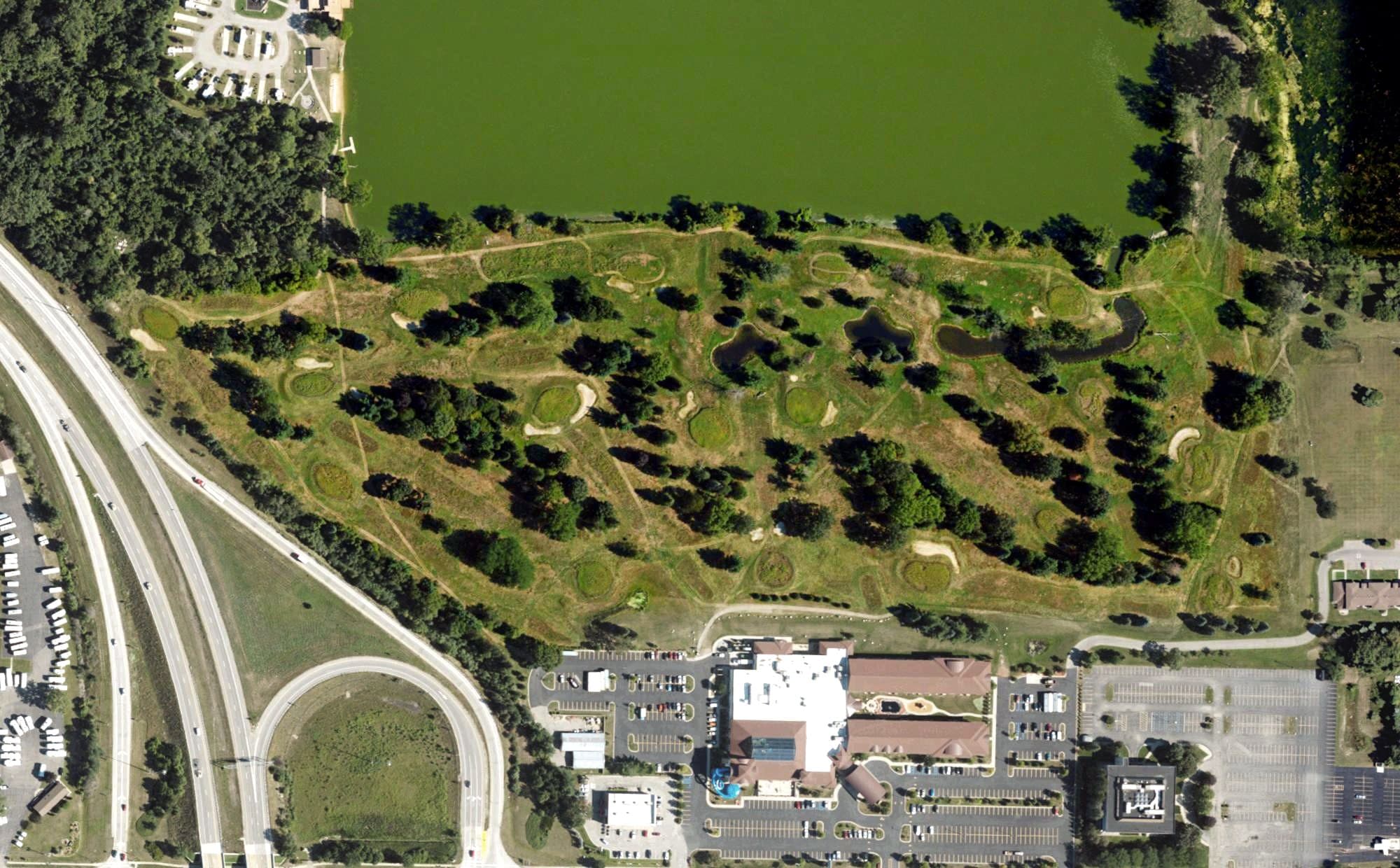 Aerial view of Waabooz Run Golf Course, MI, with its hole routing marked