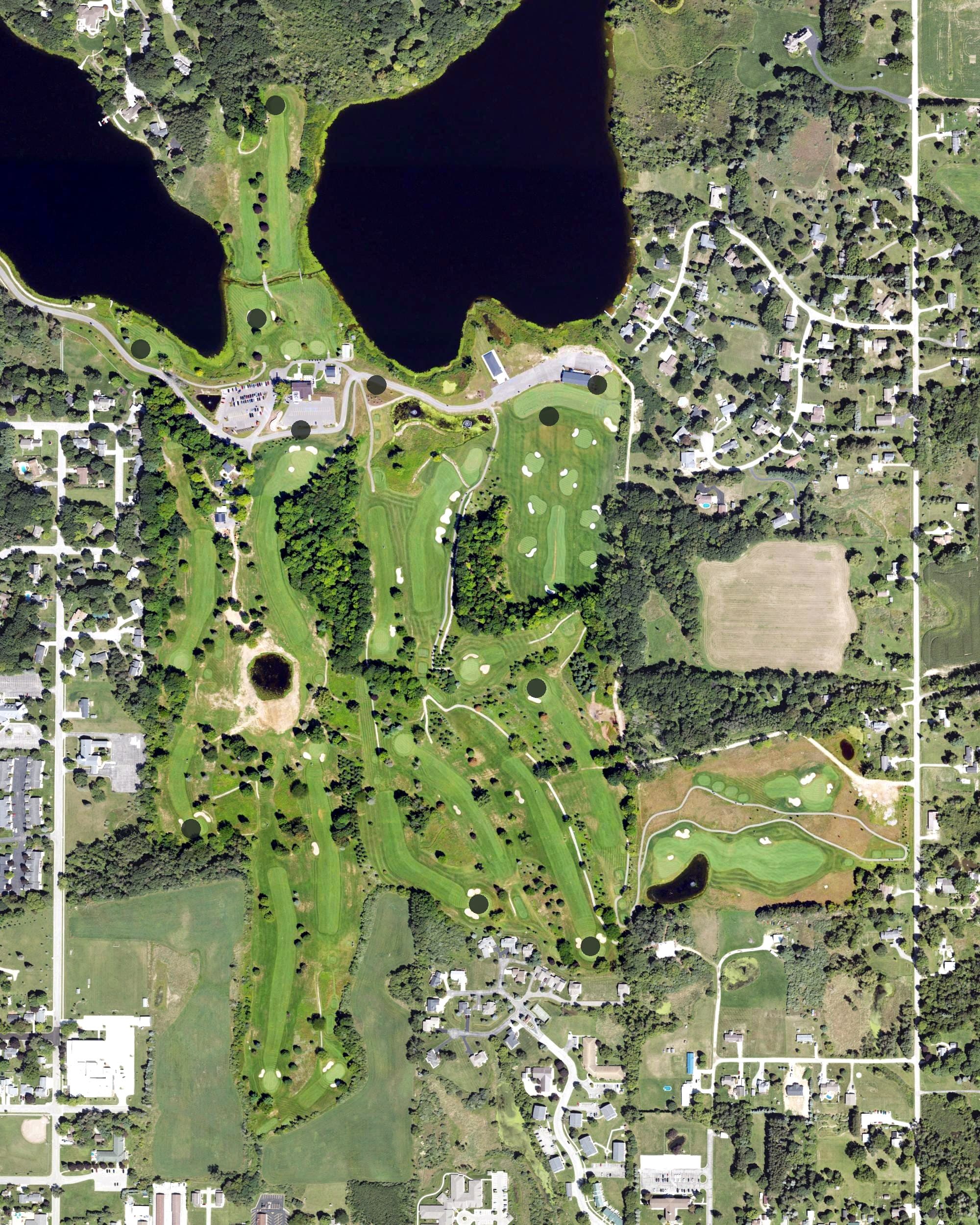 Aerial view of Waters Edge Golf Course, MI, with its hole routing marked