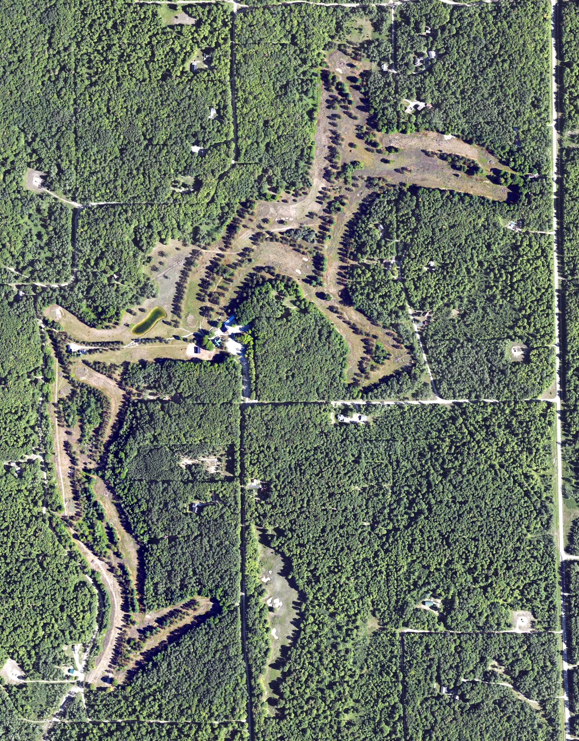 Aerial view of Wilderness Valley, MI, with its hole routing marked