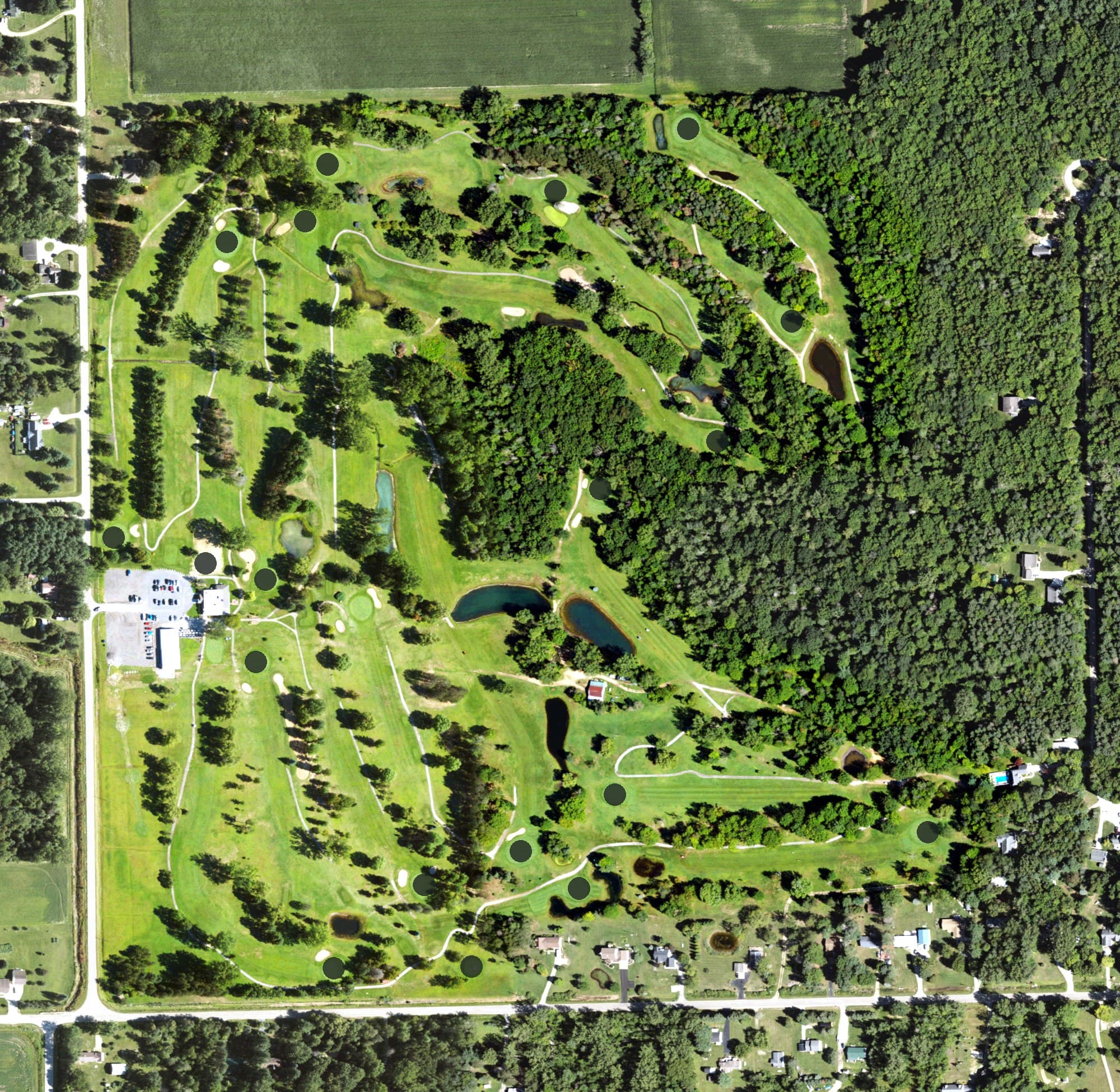 Aerial view of Willow Springs Golf and Country Club, MI, with its hole routing marked