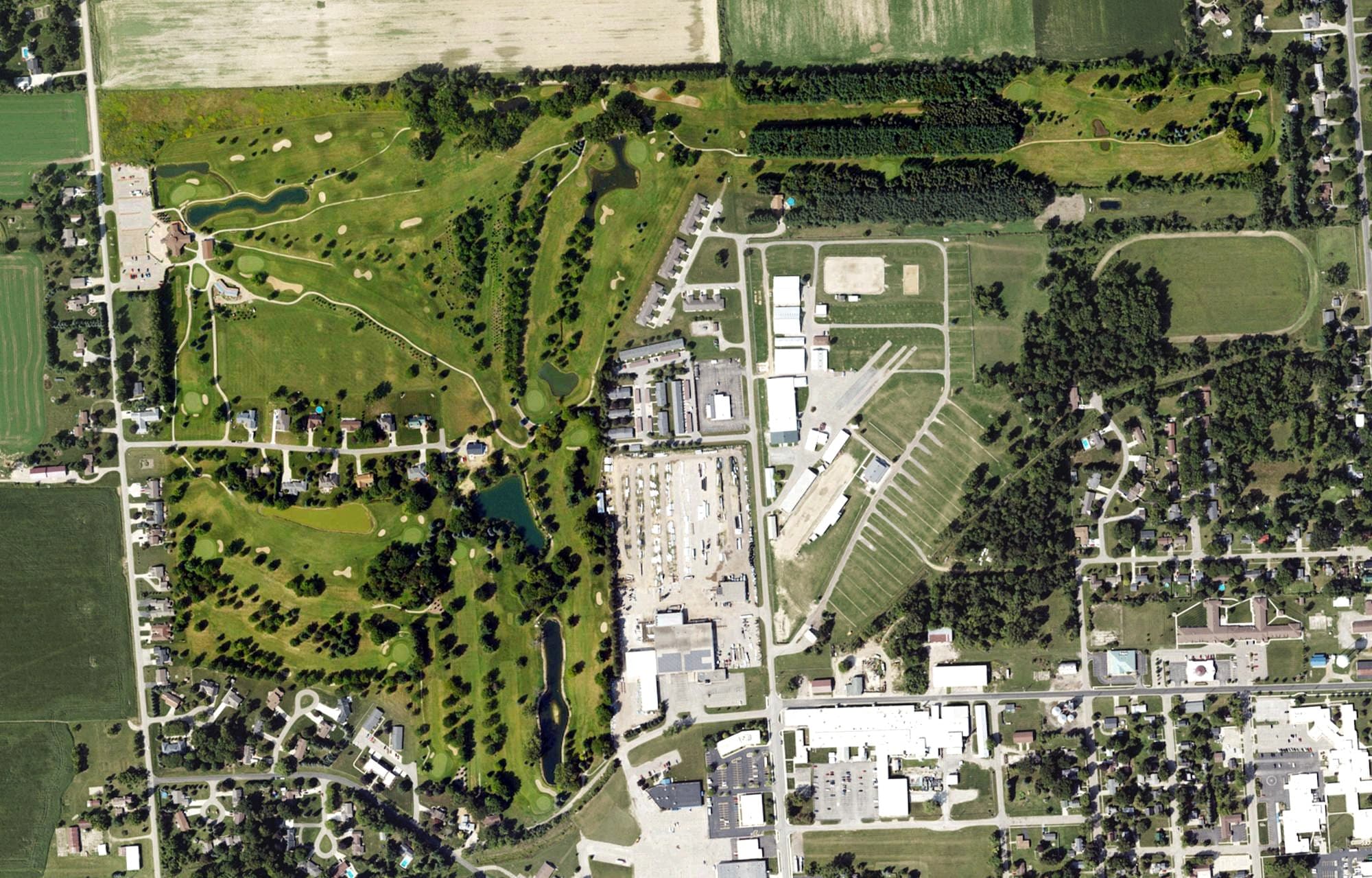 Aerial view of Woodland Hills Golf Club, MI, with its hole routing marked