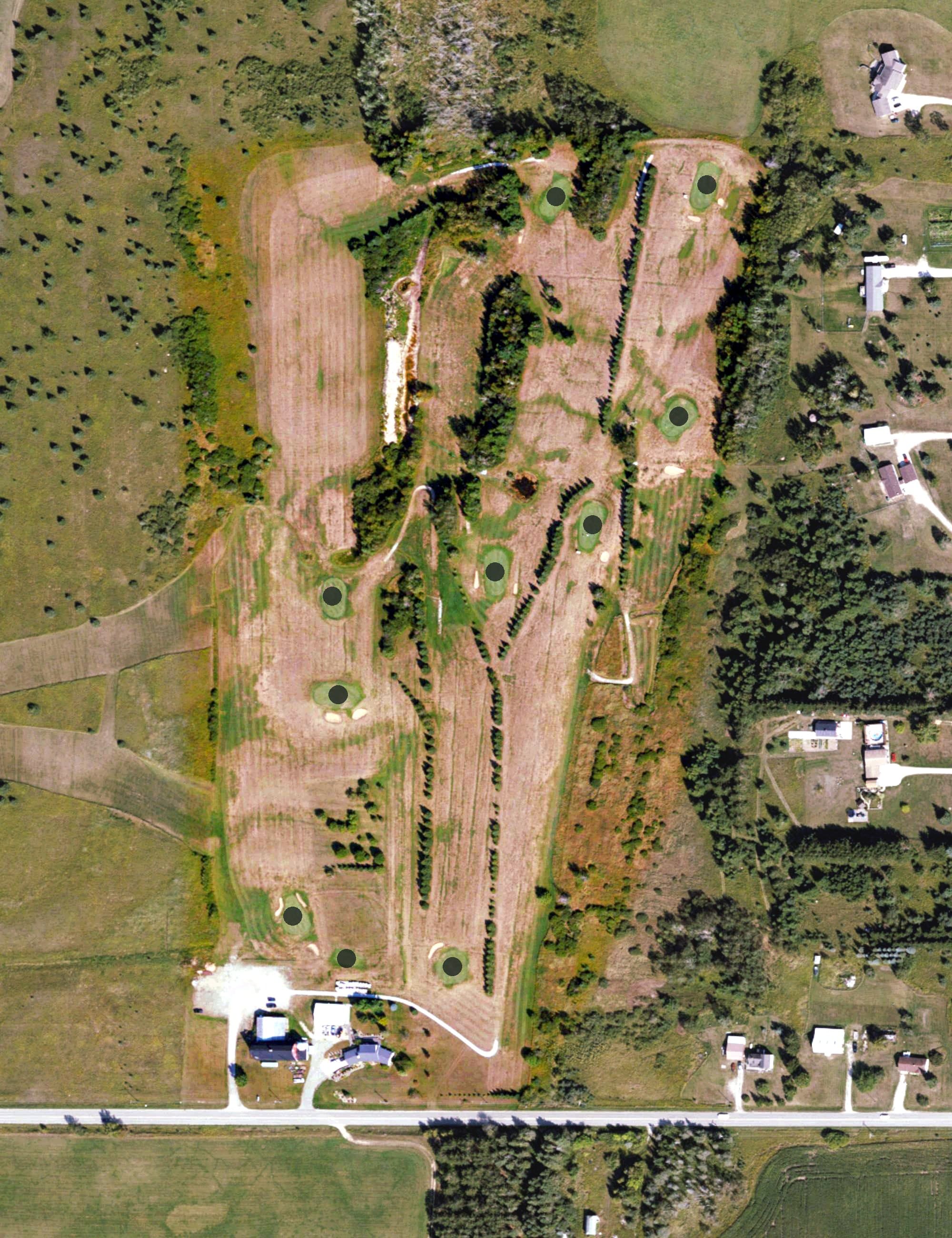 Aerial view of Woody’s Run Public Golf Course, MI, with its hole routing marked