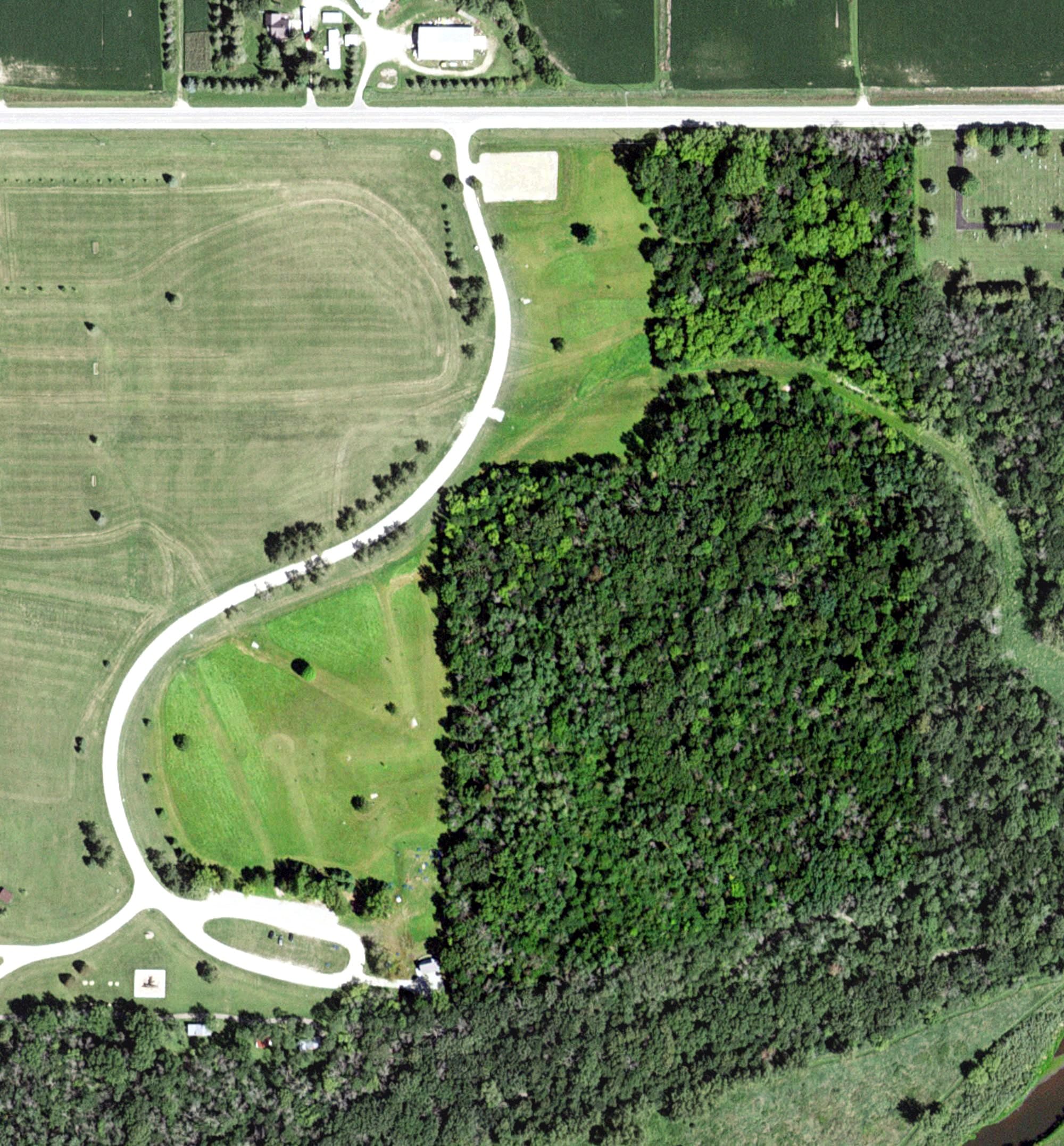 Aerial view of Bear Cave Park DISC Golf Course, MN, with its hole routing marked
