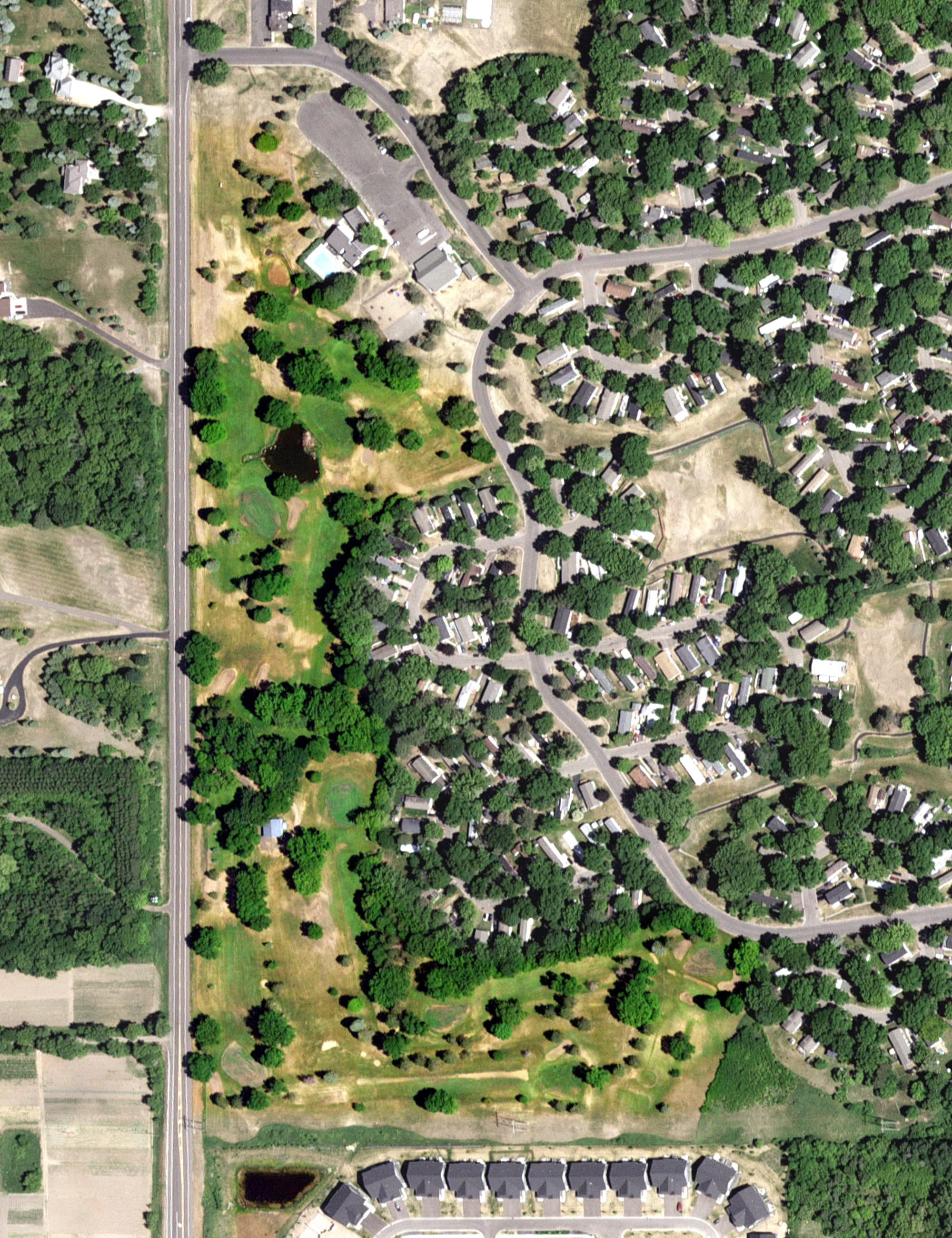 Aerial view of Cimarron Golf Course, MN, with its hole routing marked