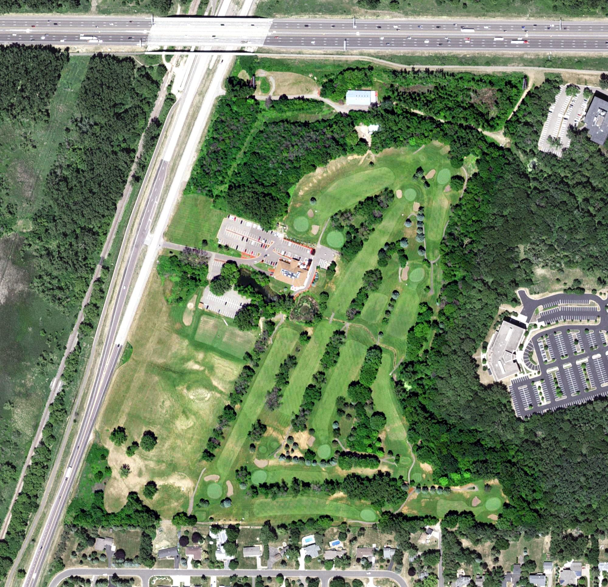 Aerial view of Lost Spur Country Club, MN, with its hole routing marked