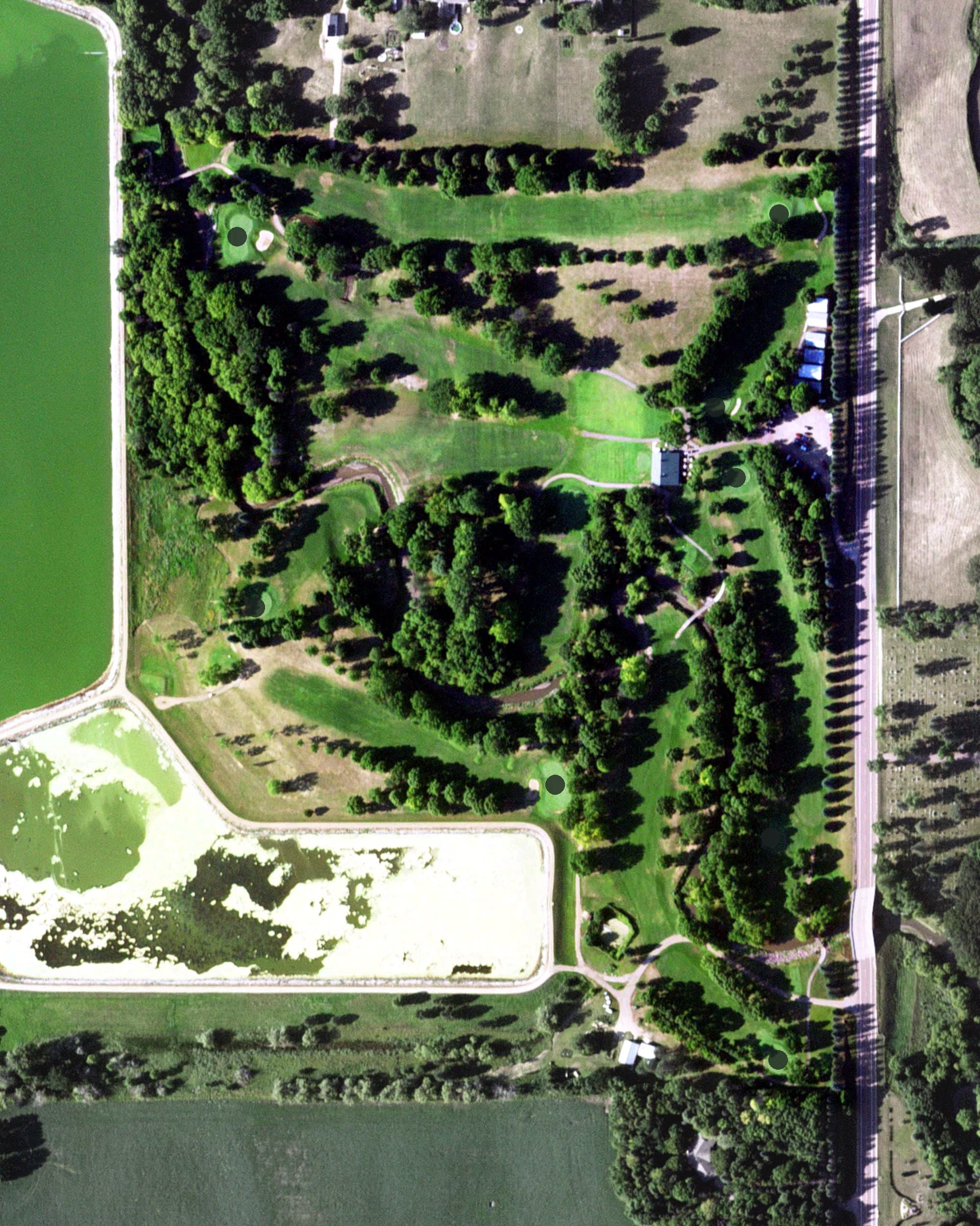 Aerial view of Slayton Country Club, MN, with its hole routing marked