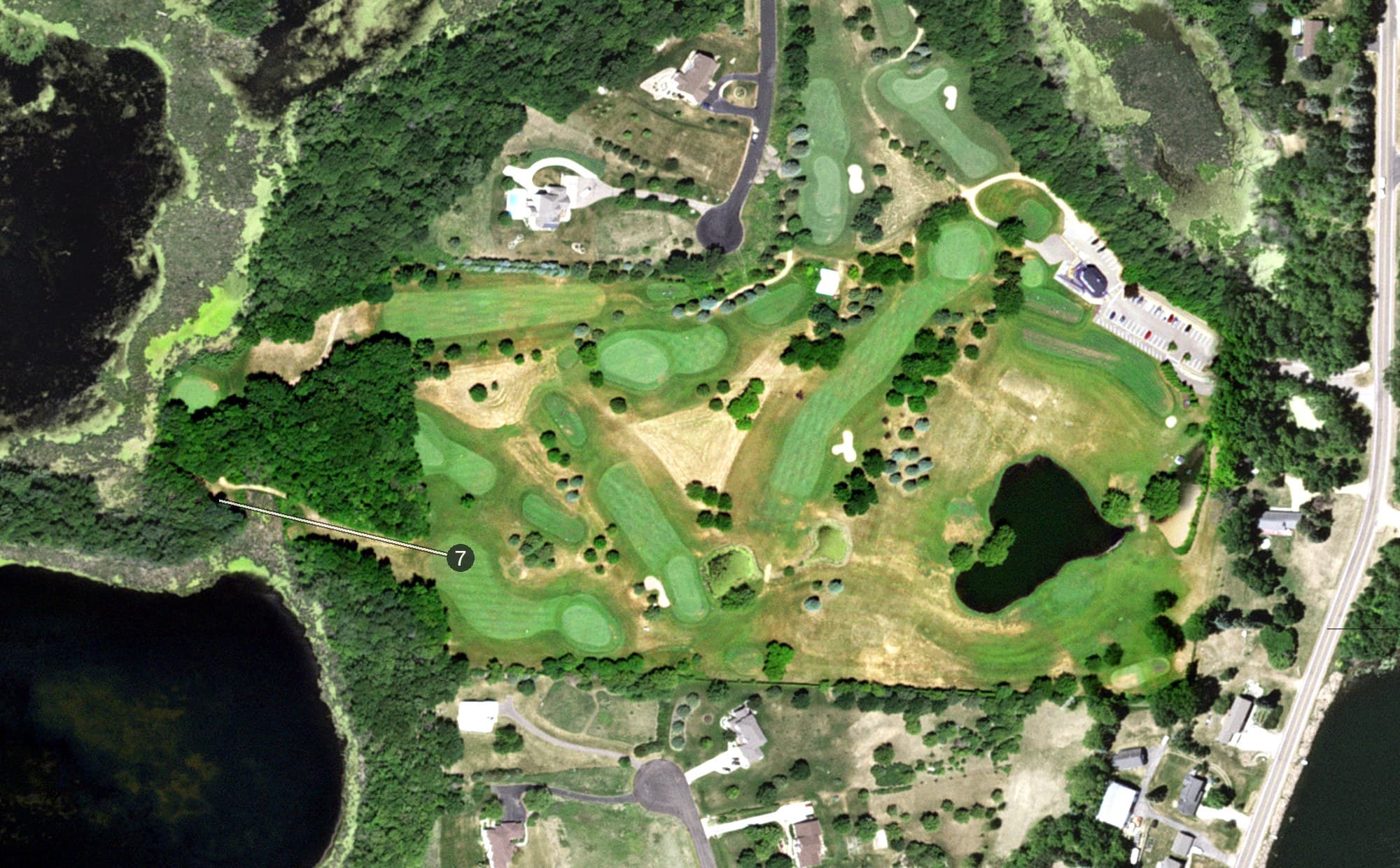 Aerial view of Water's Edge Golf Course, MN, with its hole routing marked