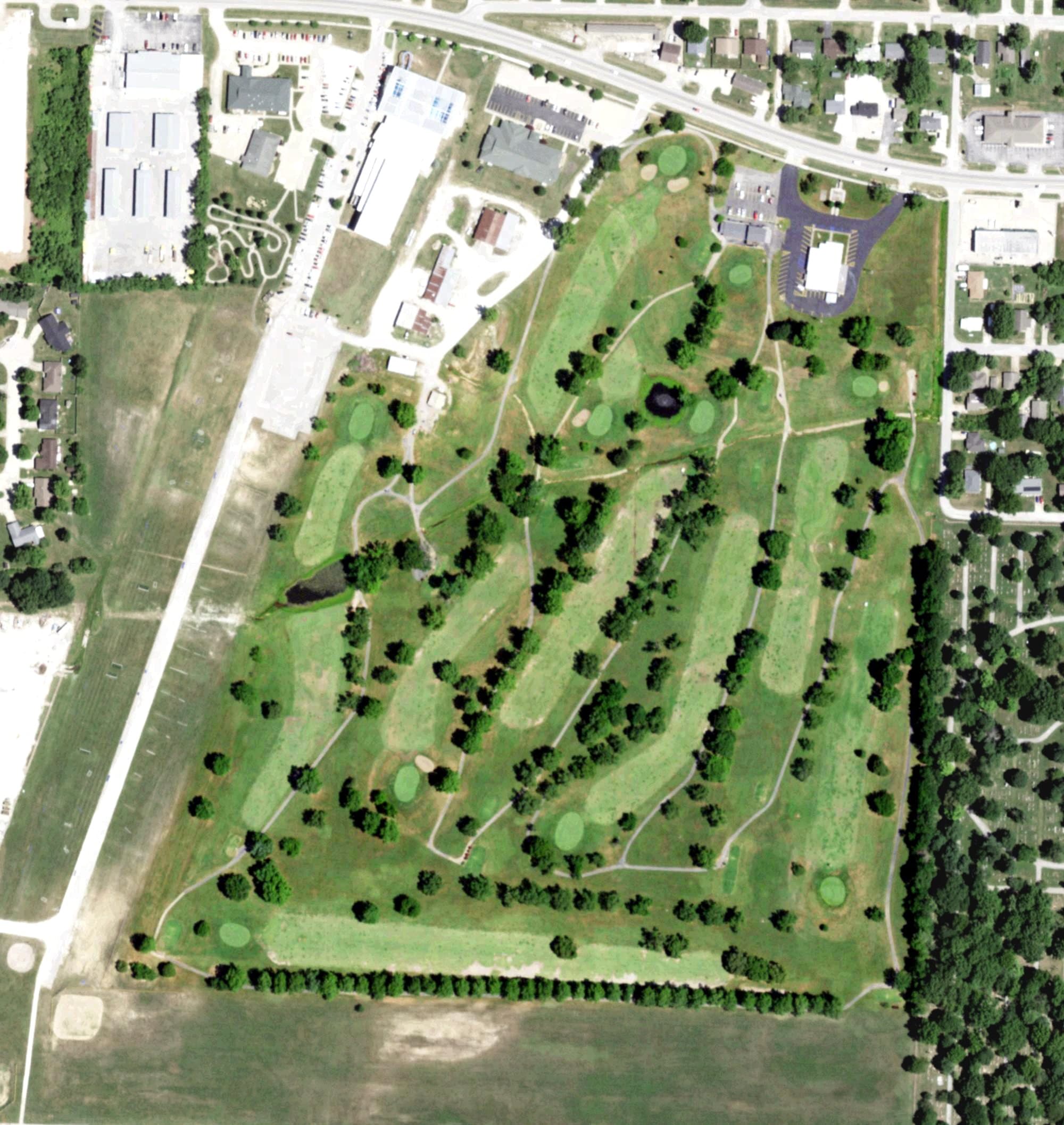 Aerial view of Bolivar Municpal Golf Course, MO, with its hole routing marked
