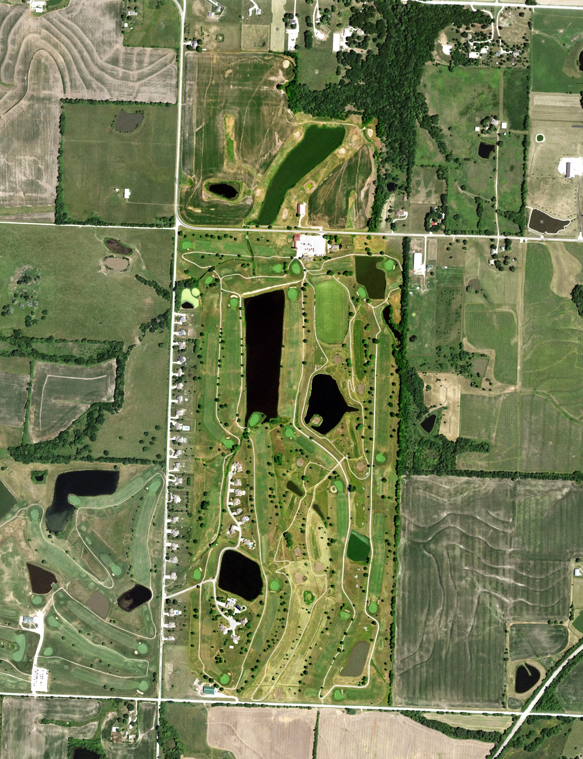 Aerial view of Country Creek Golf Club - The Rock & The Quarry, MO, with its hole routing marked