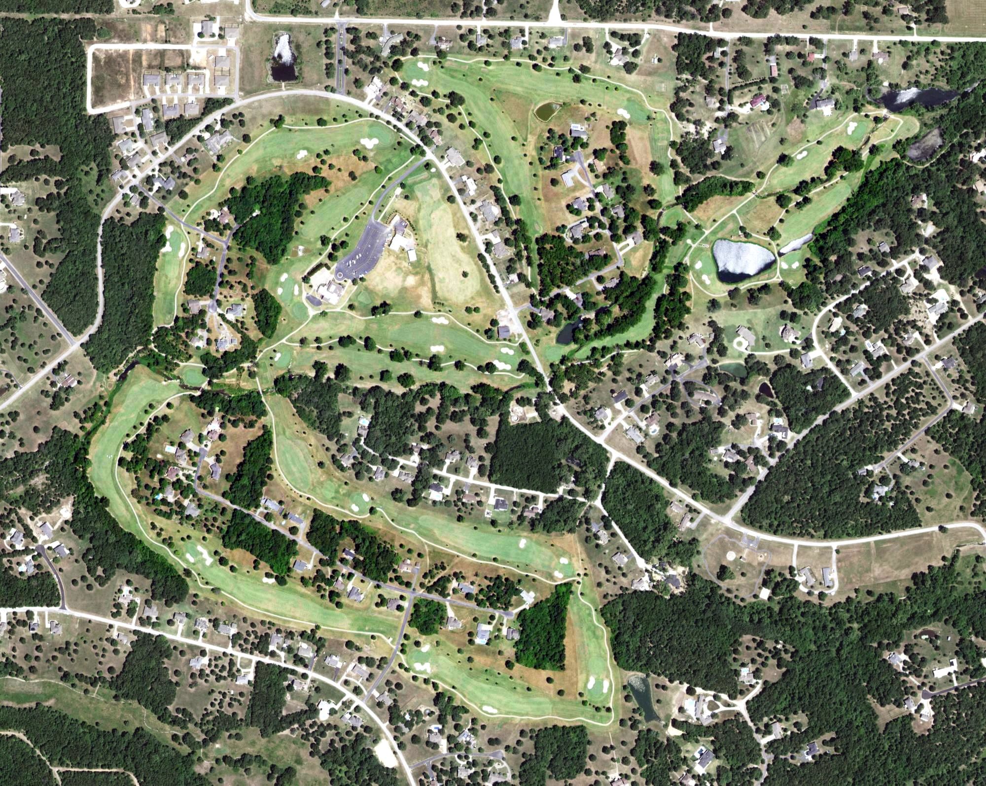 Aerial view of Eagle Creek Golf Club, MO, with its hole routing marked