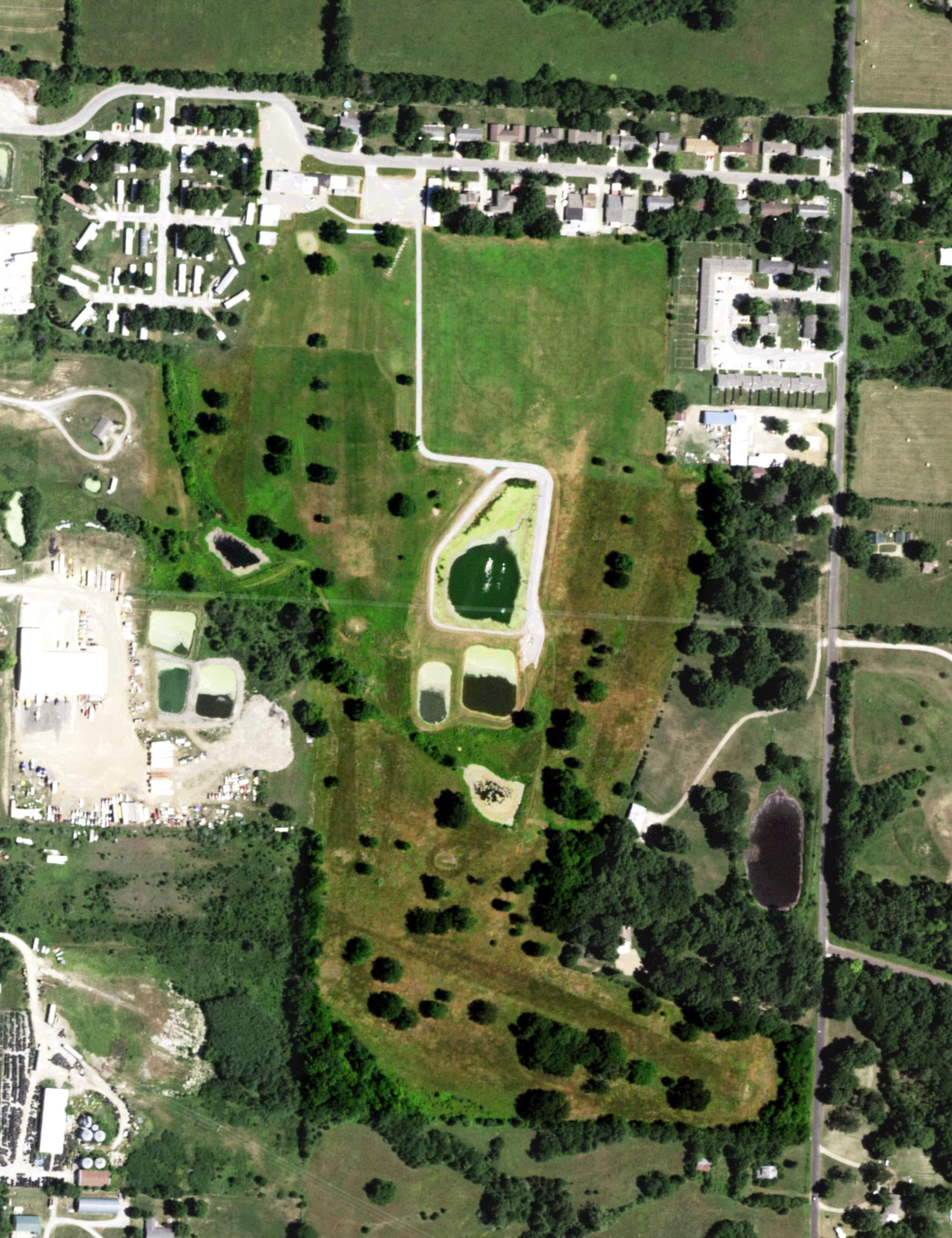 Aerial view of Elm Hills Public Golf Course, MO, with its hole routing marked