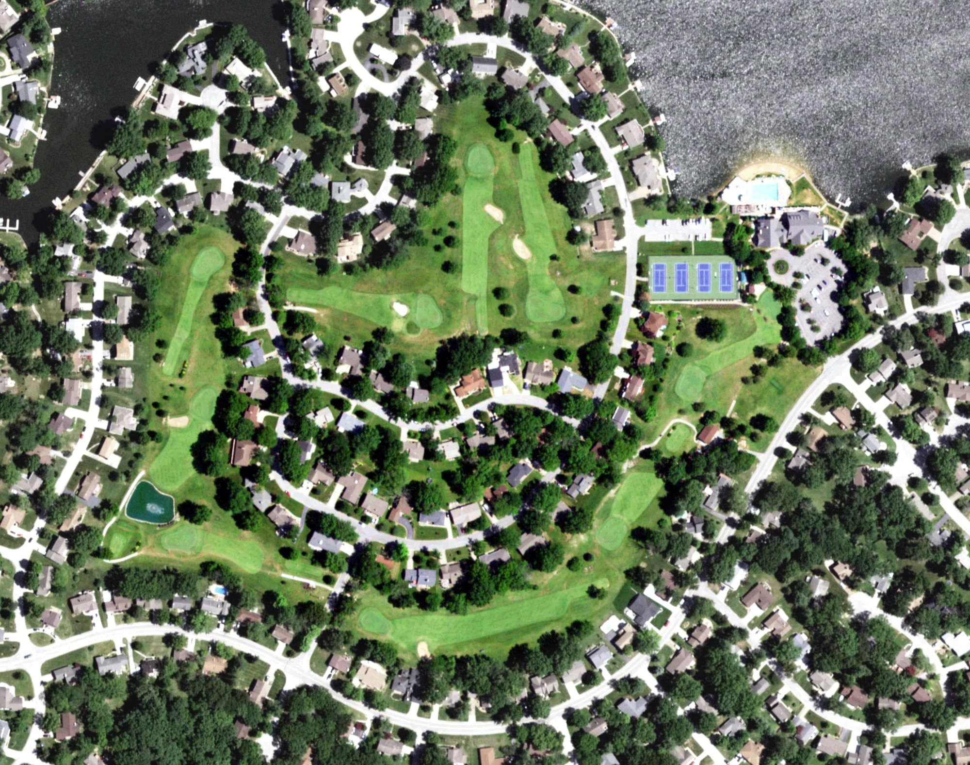 Aerial view of Lake Saint Louis 9-Hole Golf Course, MO, with its hole routing marked