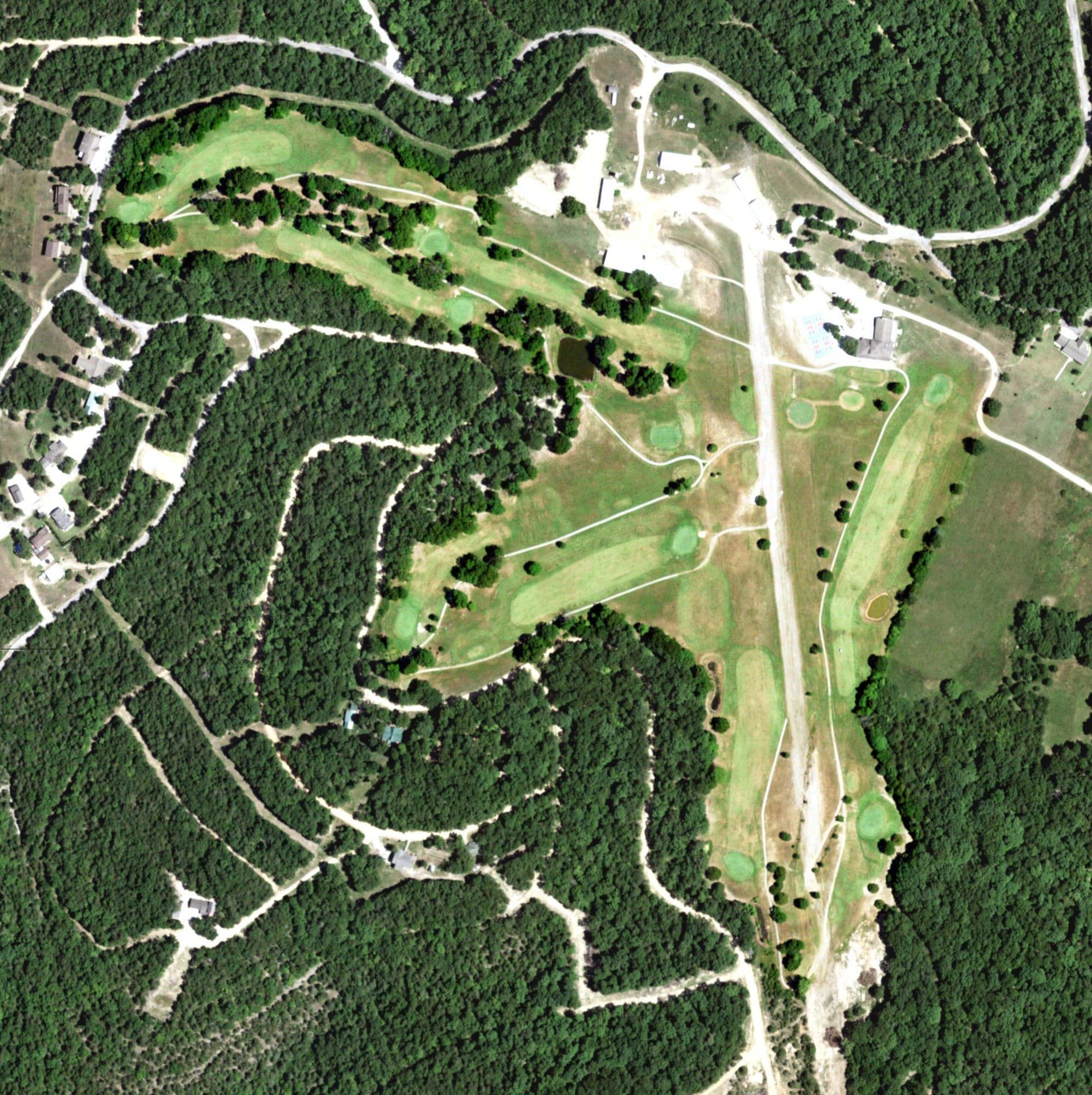 Aerial view of Lost Woods Golf Course, MO, with its hole routing marked