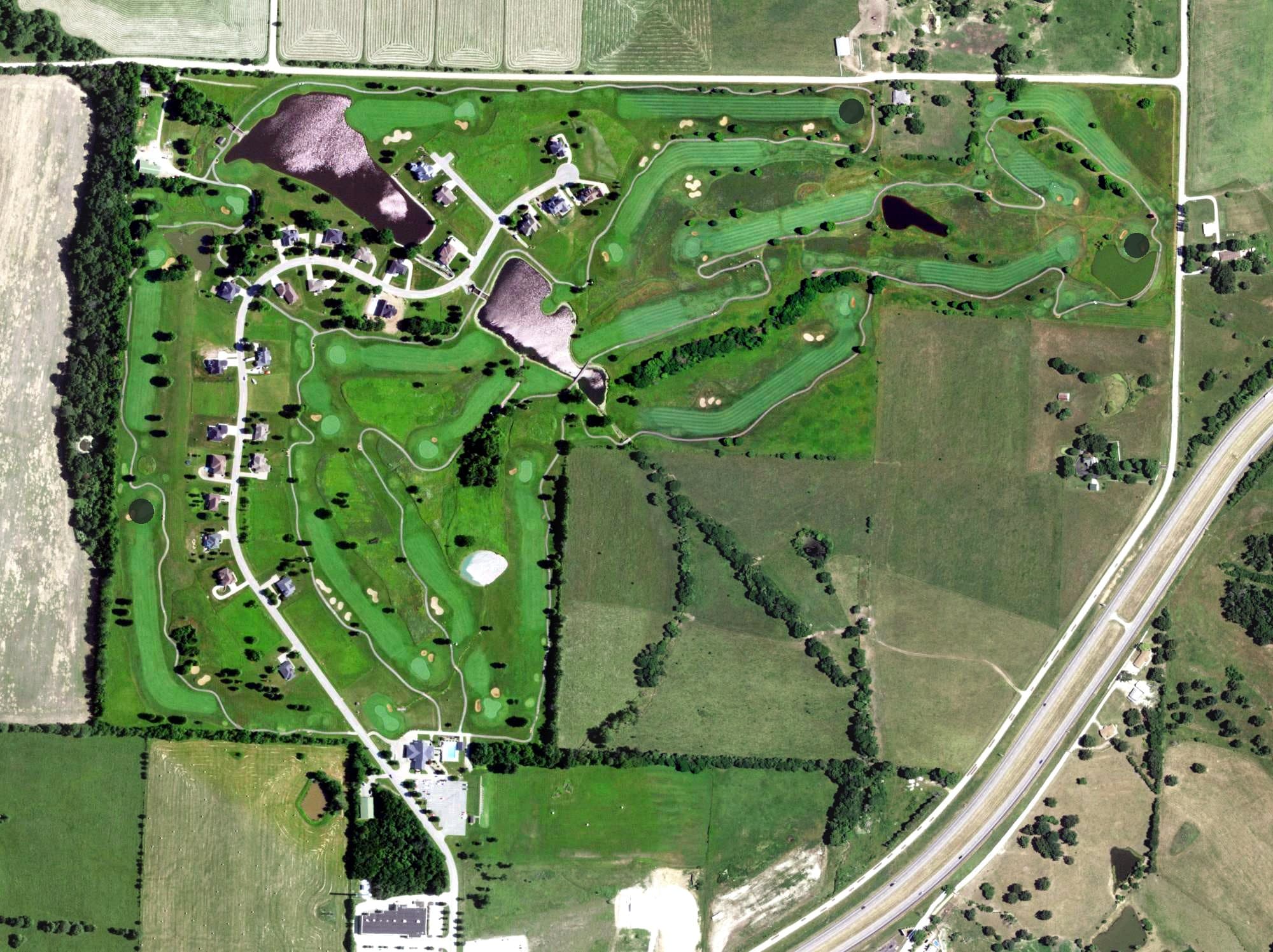 Aerial view of Redfield Golf Course, MO, with its hole routing marked