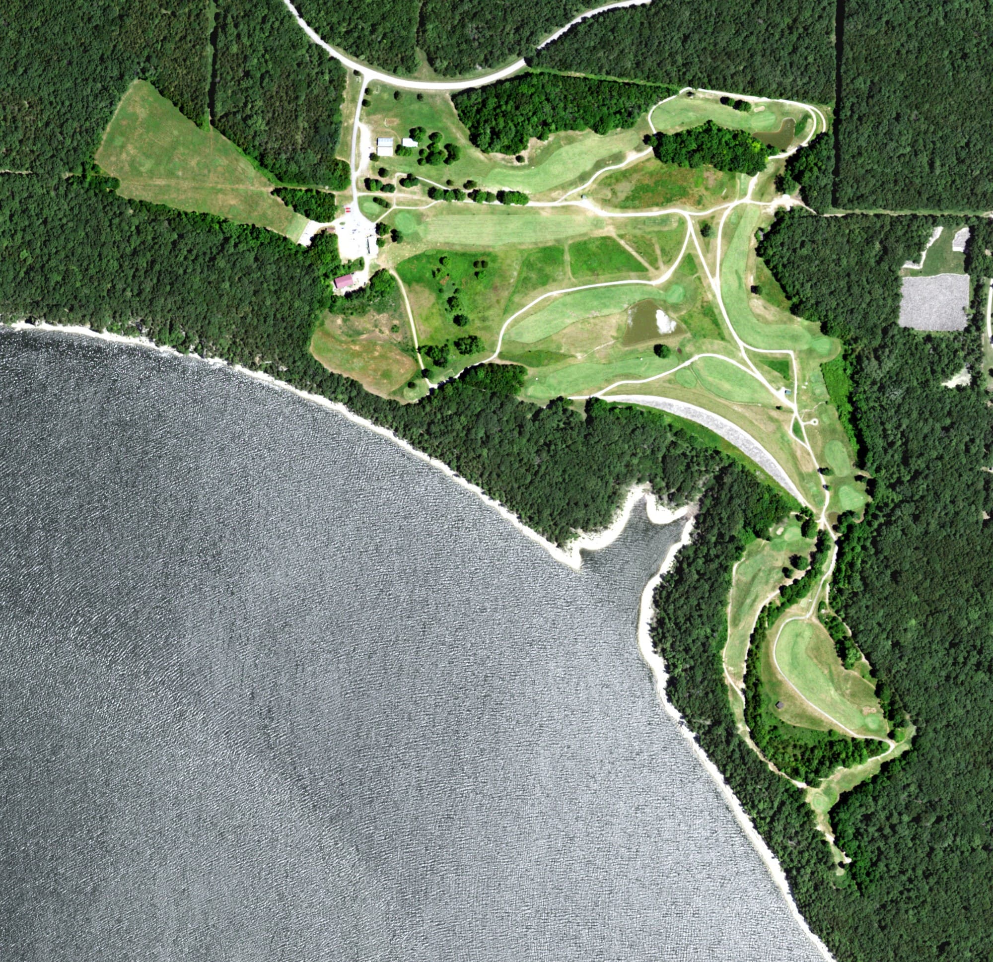 Aerial view of Shawnee Bend Golf Course, MO, with its hole routing marked