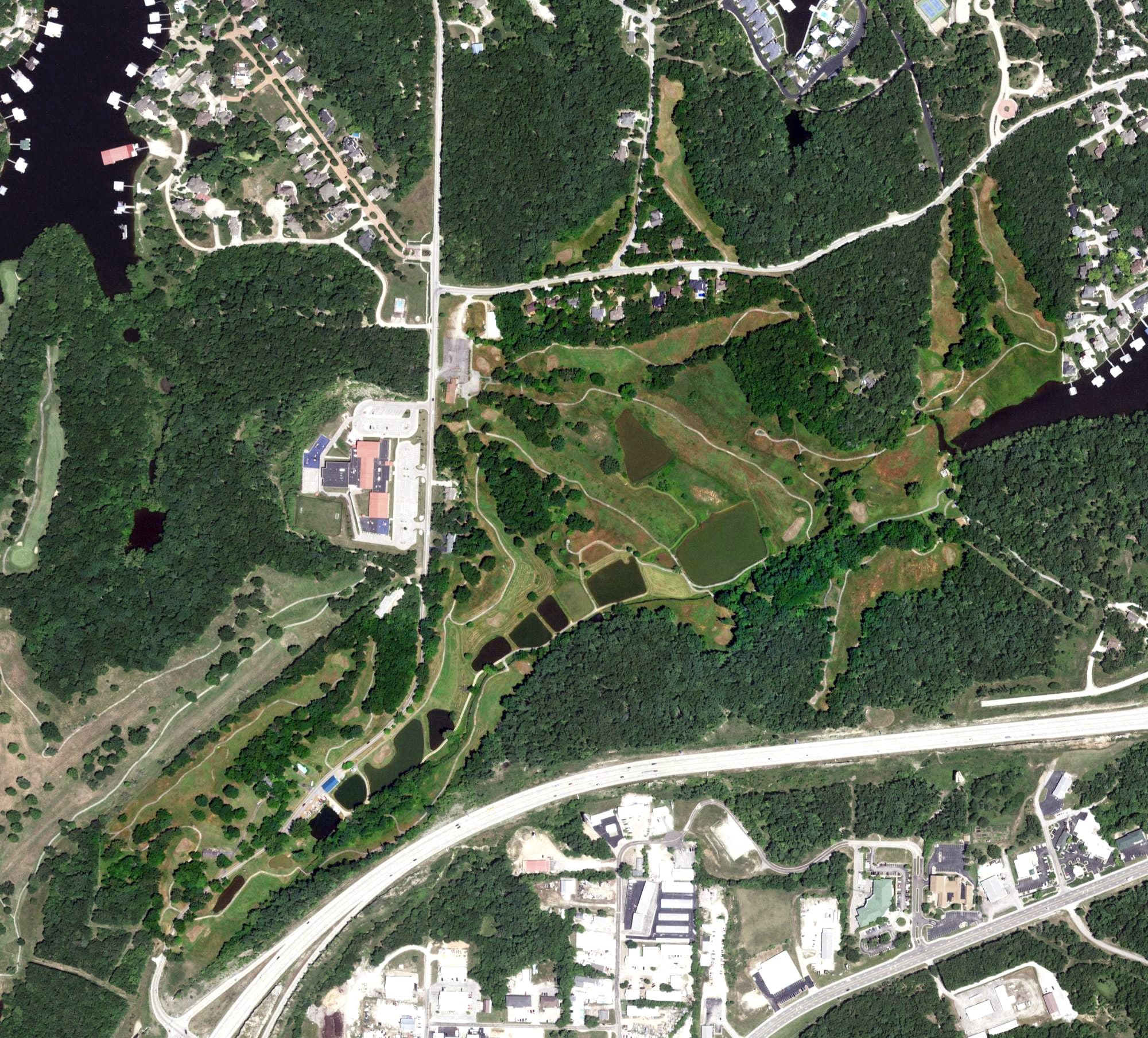 Aerial view of Sycamore Creek Golf Club, MO, with its hole routing marked