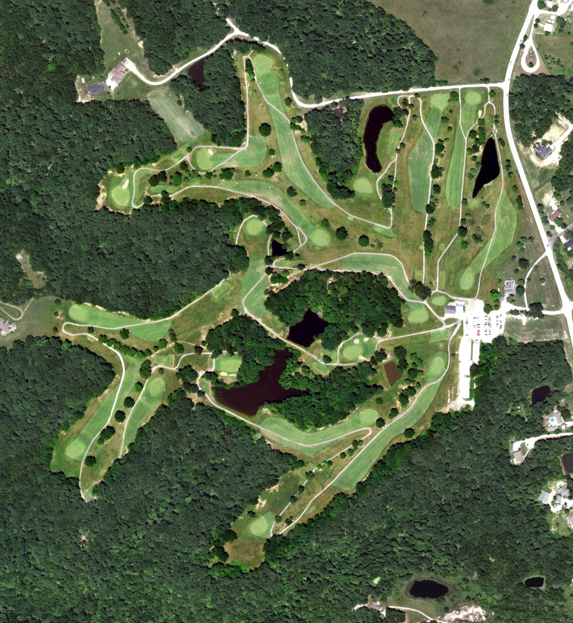 Aerial view of Warrenton Golf Course, MO, with its hole routing marked