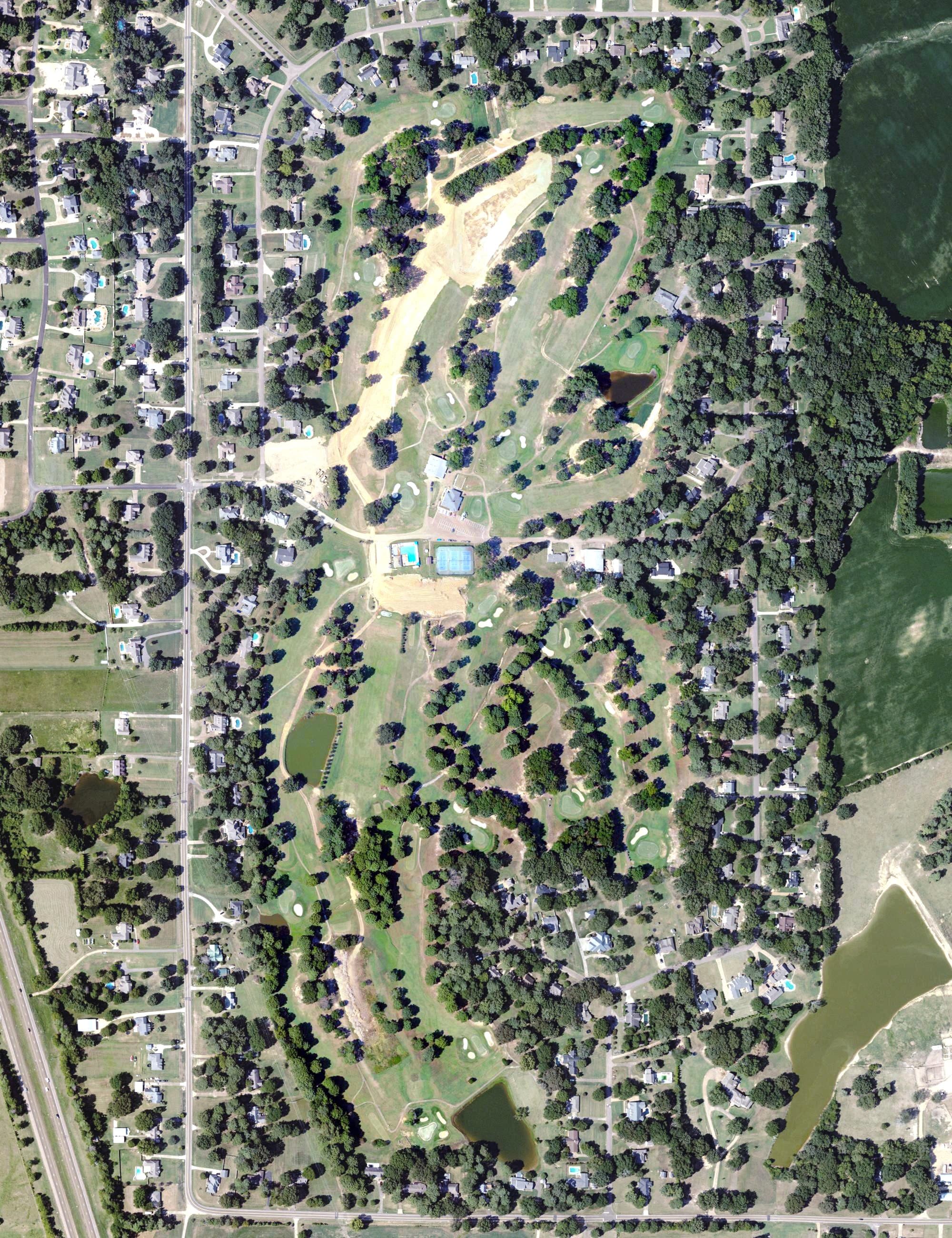 Aerial view of Back Acres Country Club, MS, with its hole routing marked