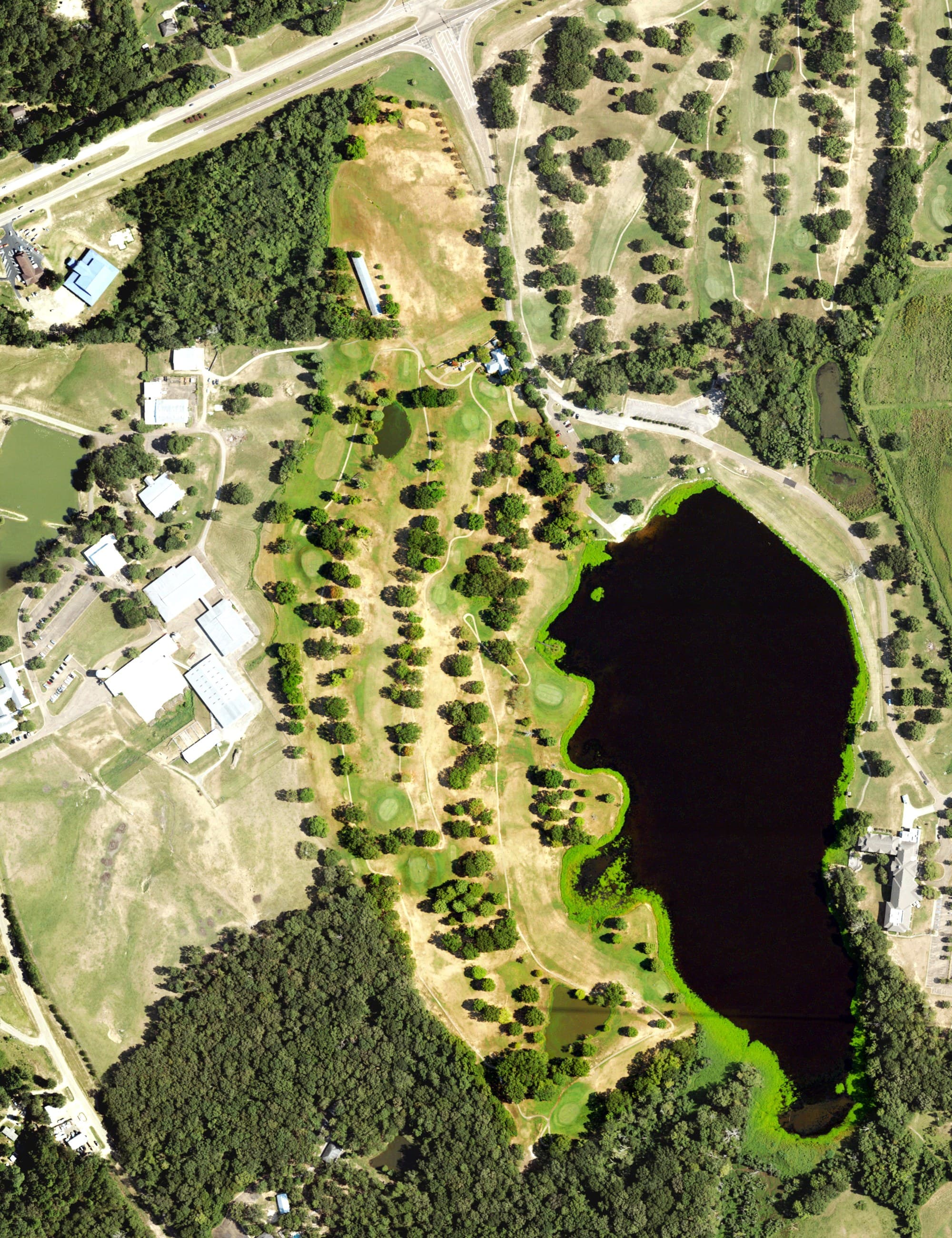 Aerial view of Eagle Ridge Driving Range, MS, with its hole routing marked