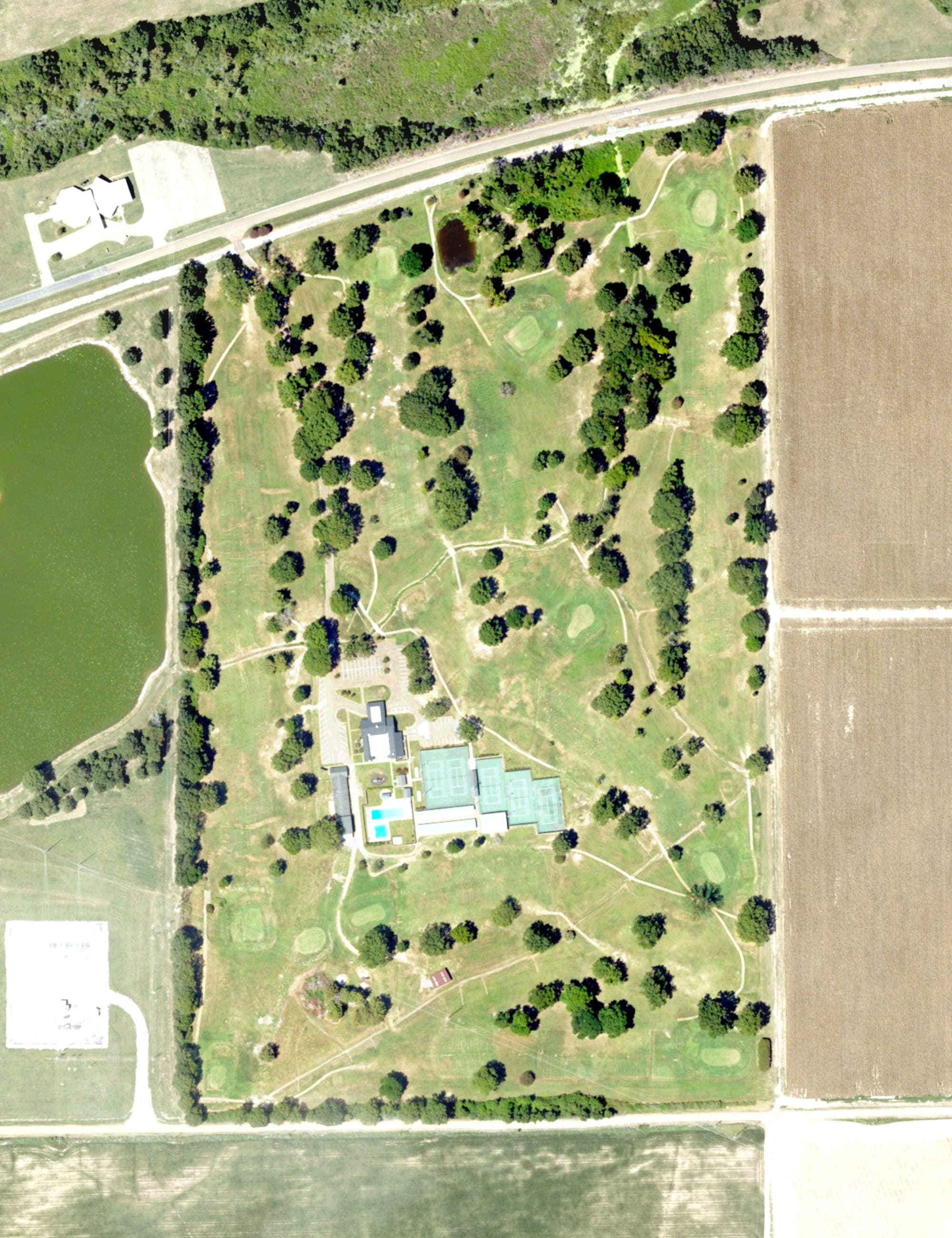 Aerial view of Indianola Country Club, MS, with its hole routing marked
