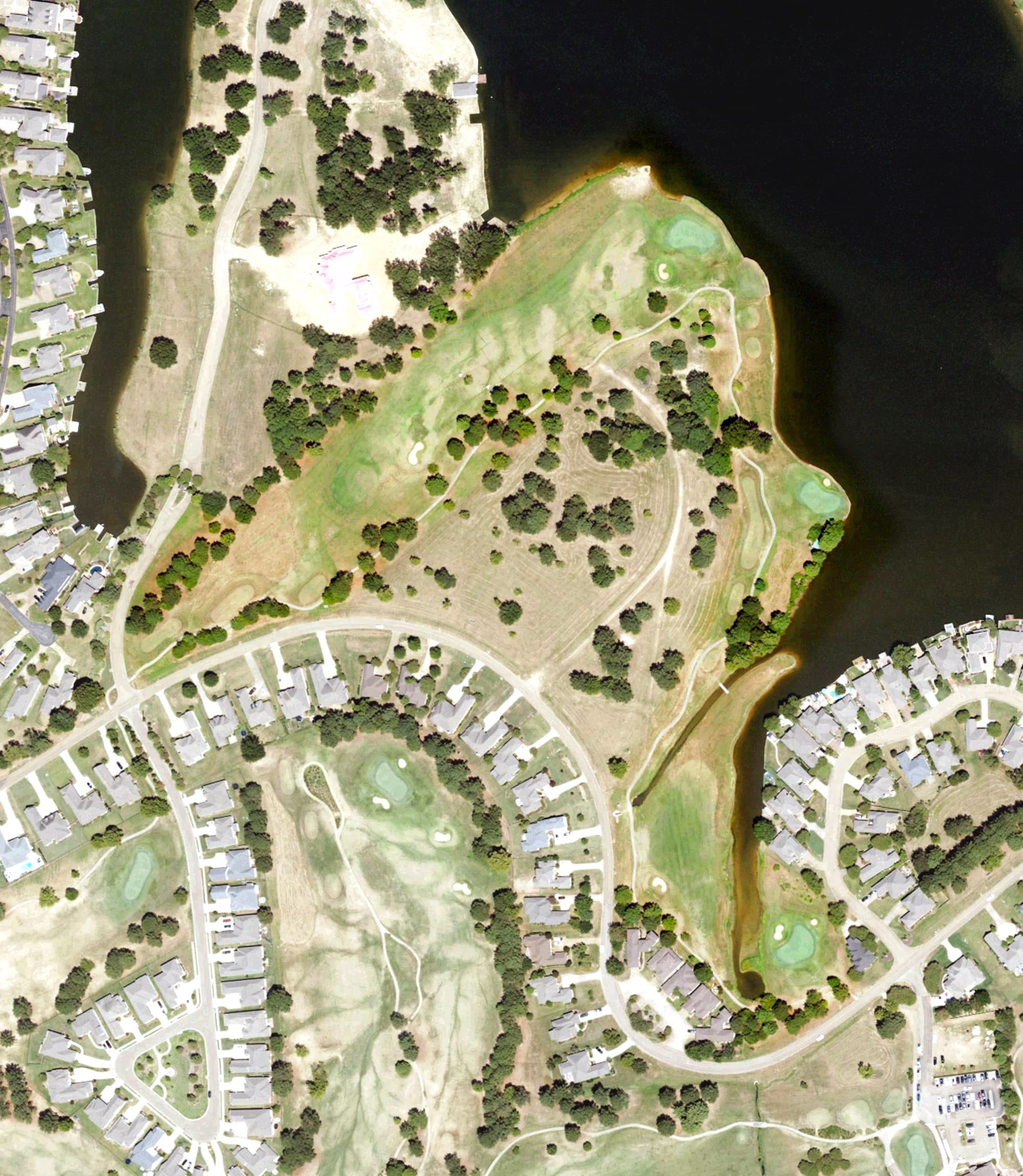 Aerial view of Lake Caroline Golf Club, MS, with its hole routing marked