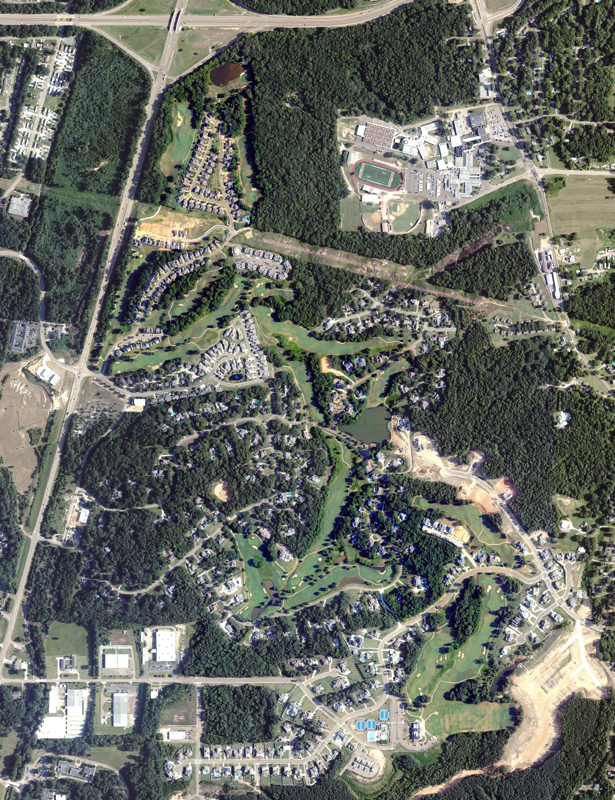 Aerial view of The Country Club of Oxford, MS, with its hole routing marked