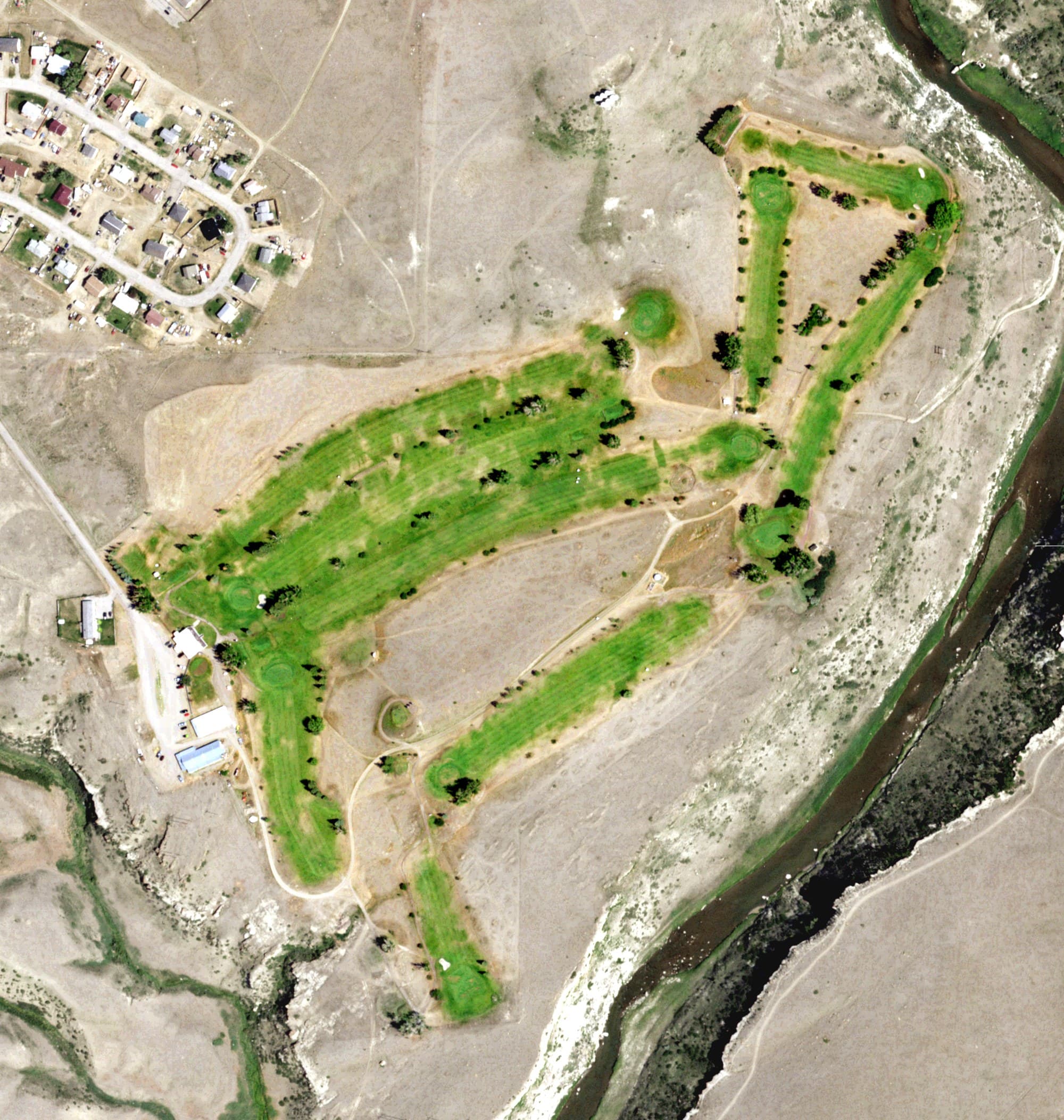 Aerial view of Cut Bank Golf & Country Club, MT, with its hole routing marked