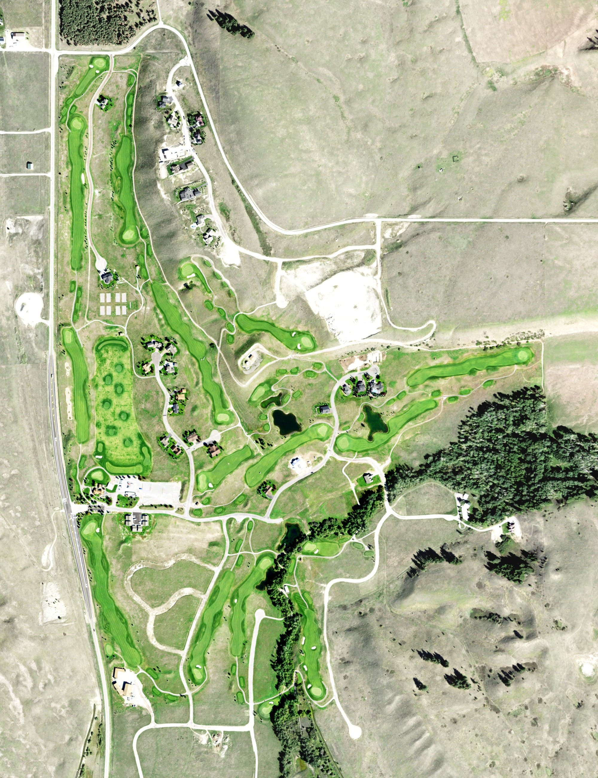 Aerial view of Indian Springs Golf Course, MT, with its hole routing marked