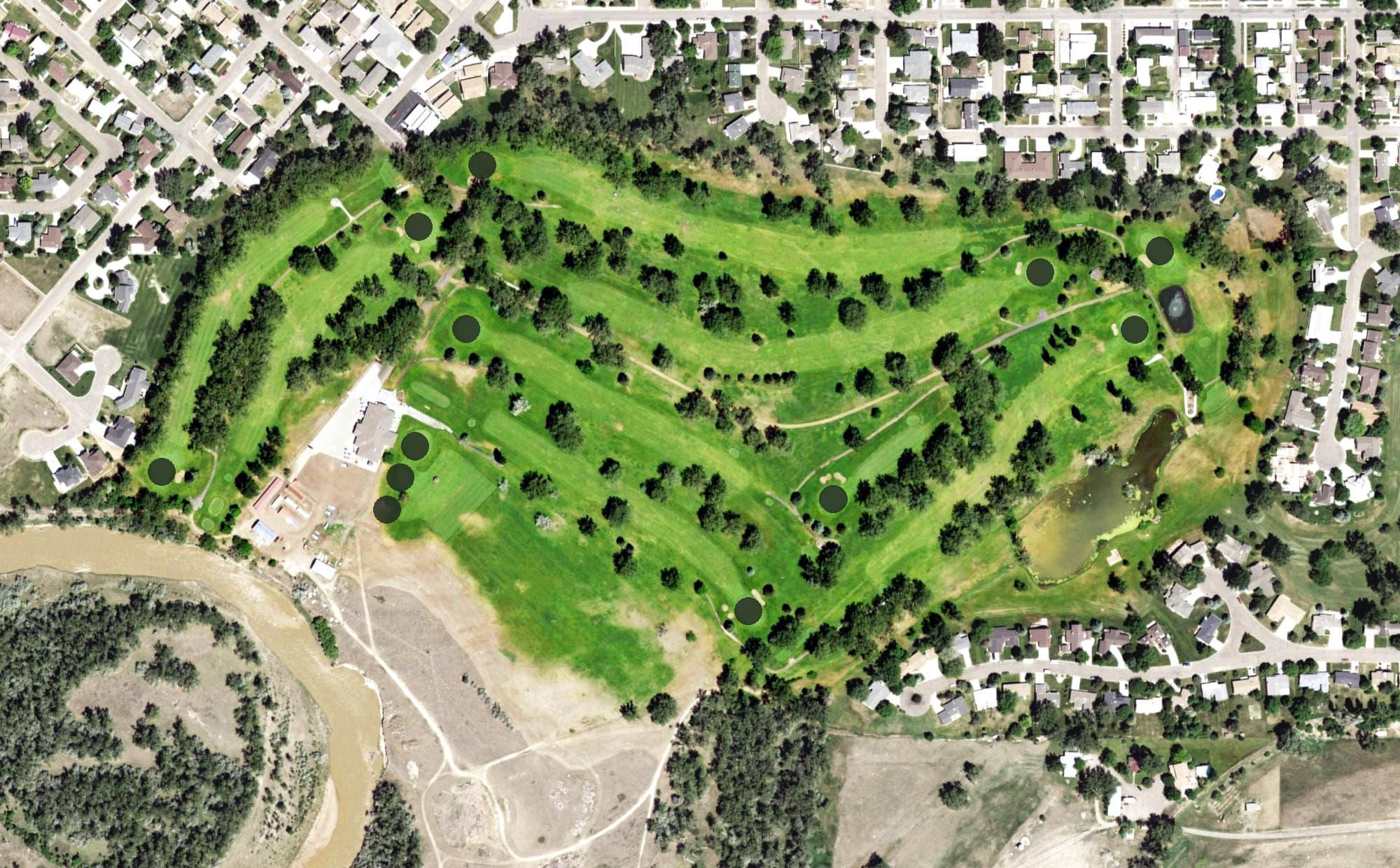 Aerial view of Miles City Town and Country Club, MT, with its hole routing marked
