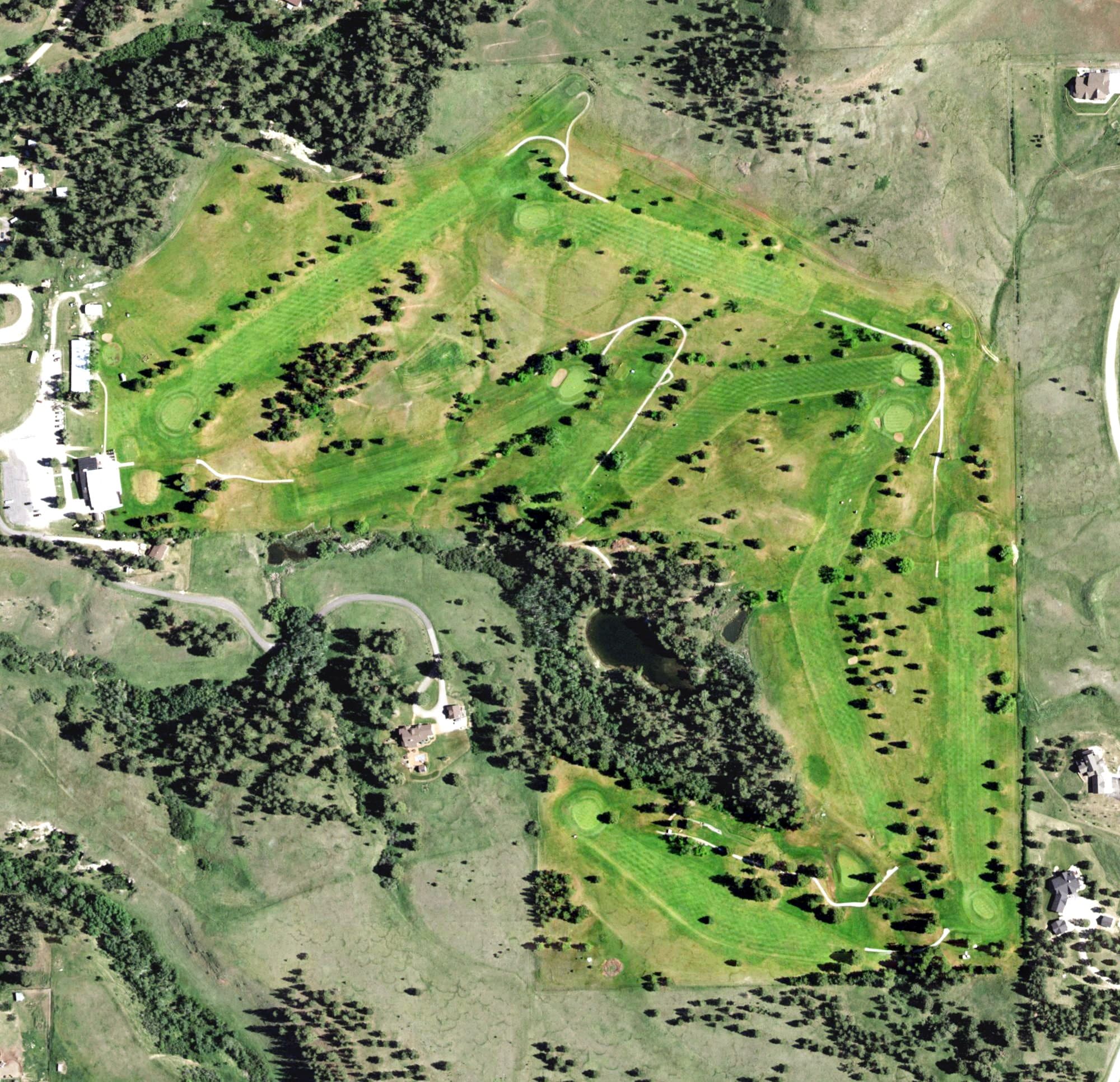 Aerial view of Pine Meadows Golf Course, MT, with its hole routing marked