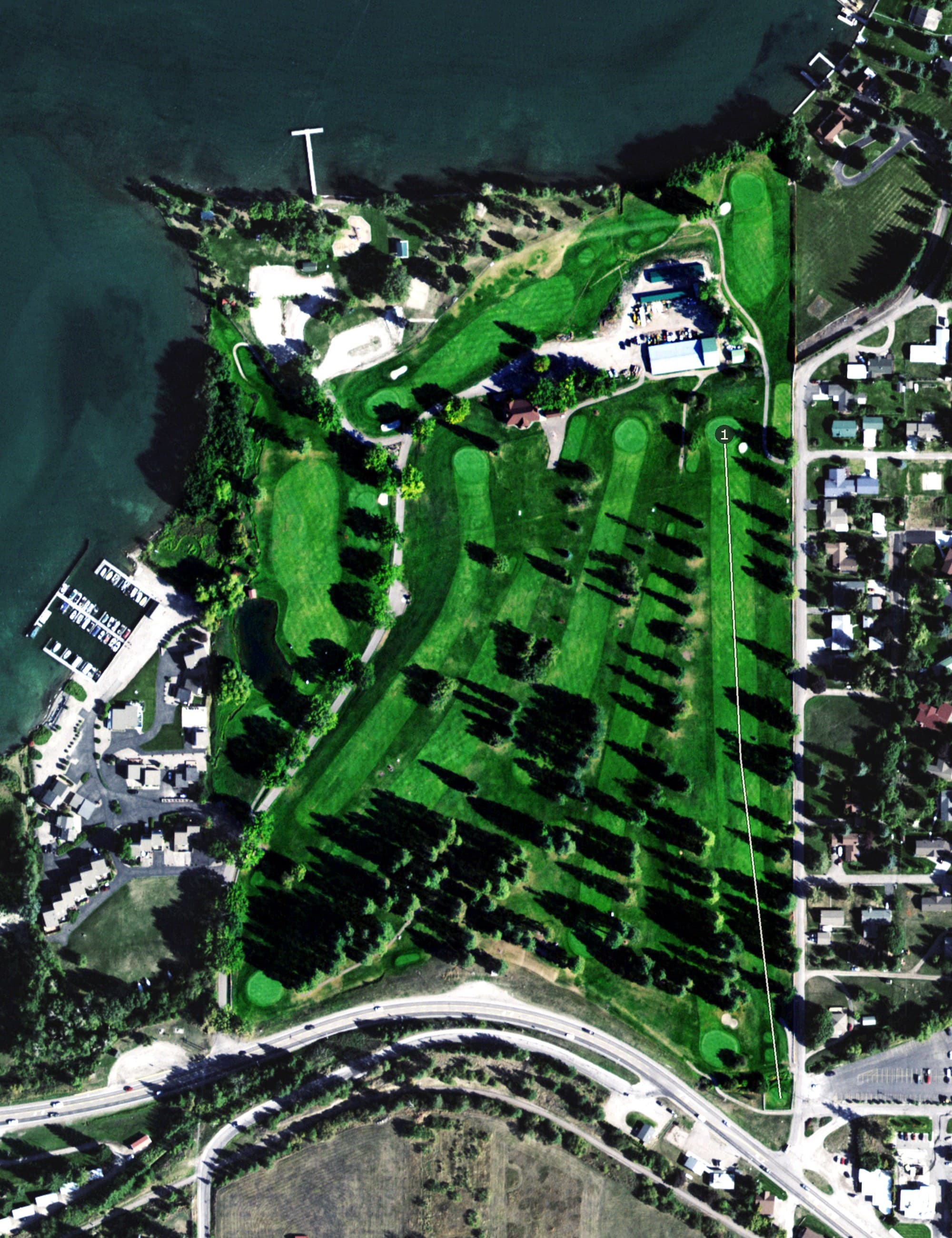 Aerial view of Polson Bay Olde Course, MT, with its hole routing marked