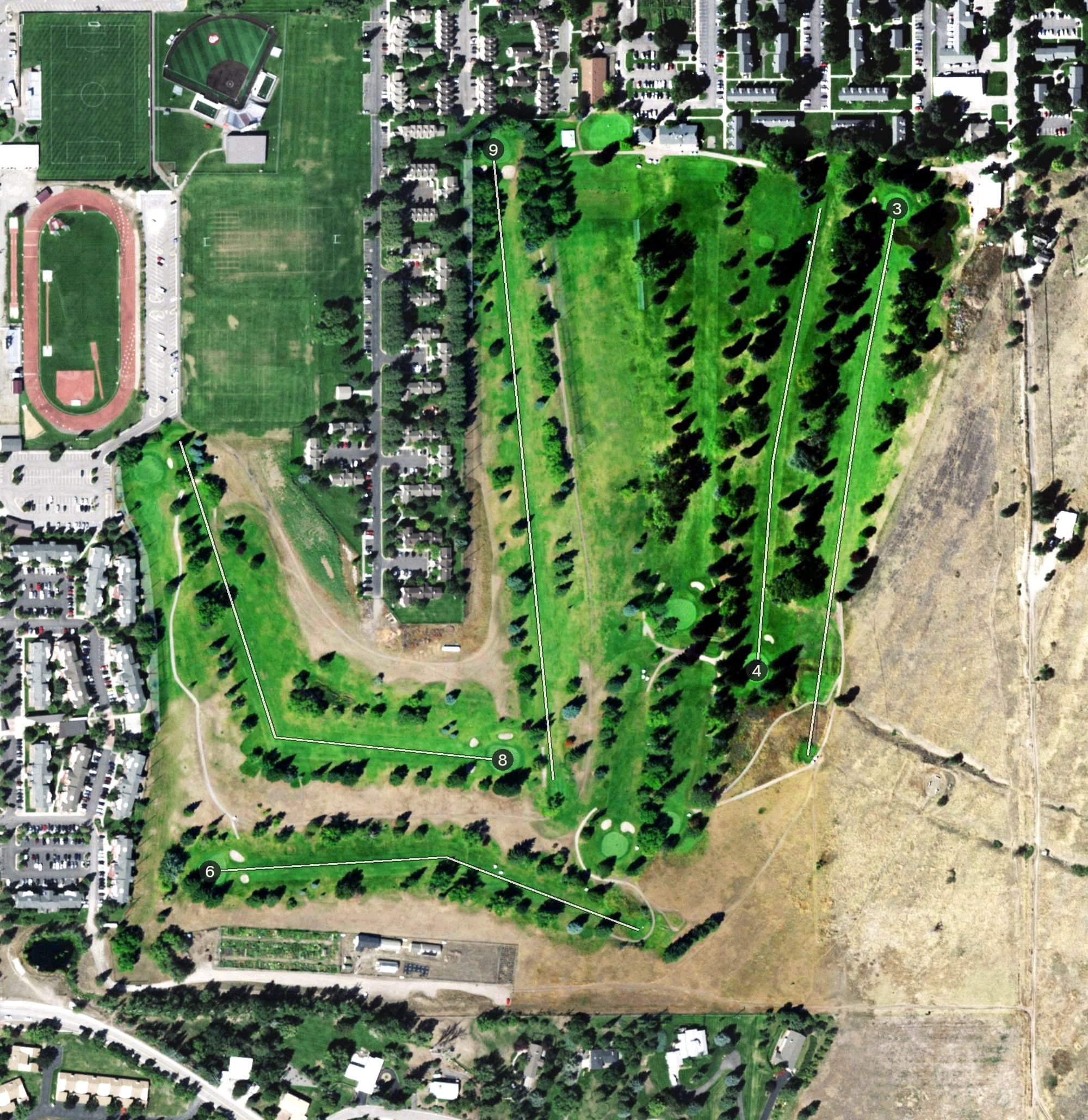 Aerial view of University Golf Course, MT, with its hole routing marked