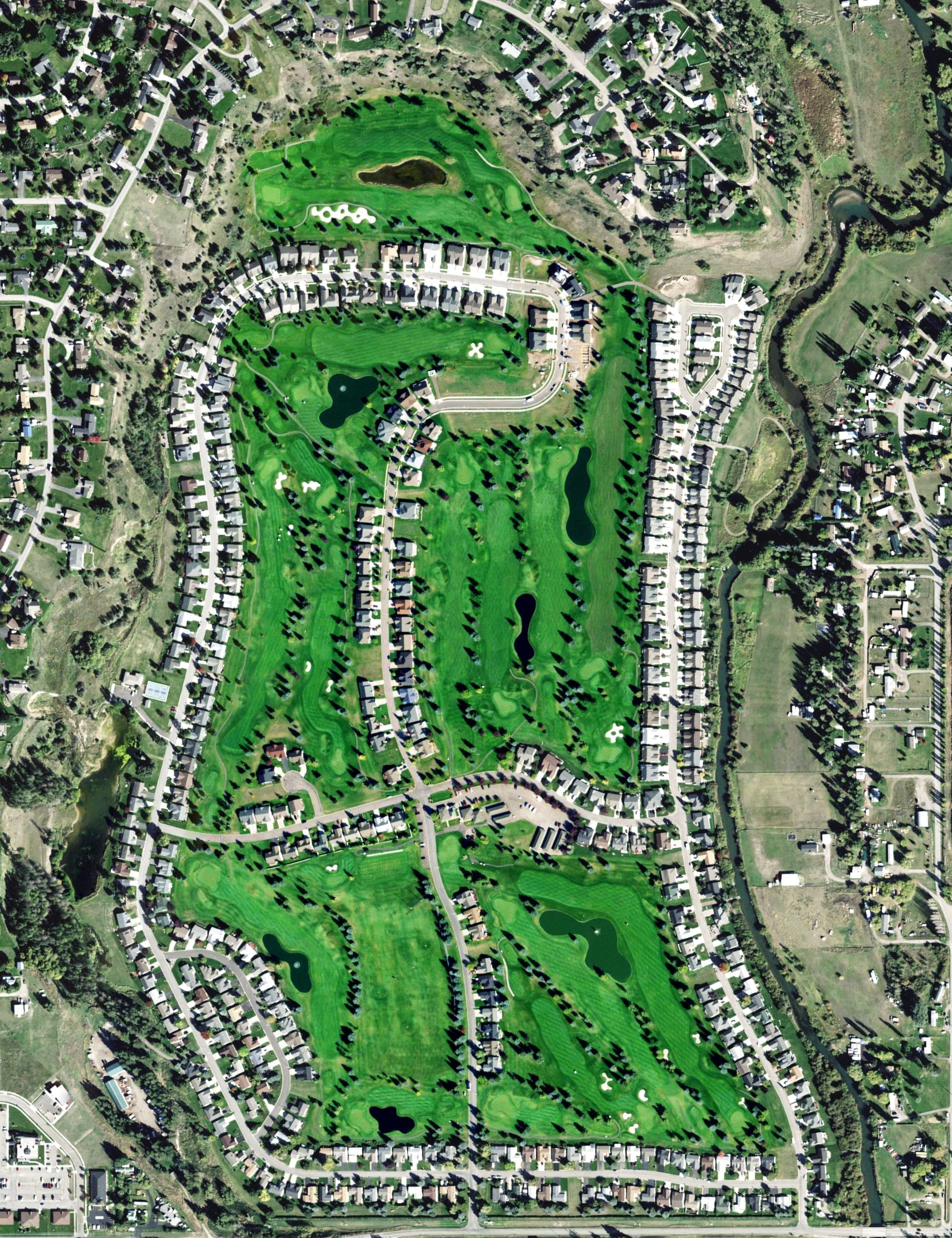 Aerial view of Village Greens Golf Club, MT, with its hole routing marked