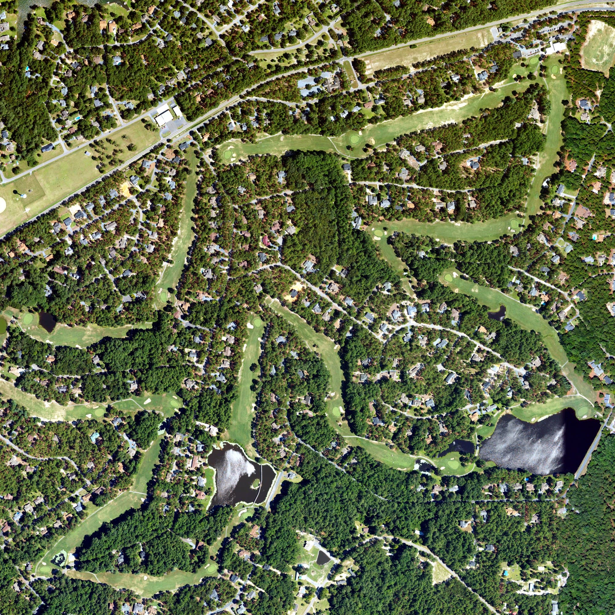 Aerial view of 7 Lakes Golf Club, NC, with its hole routing marked