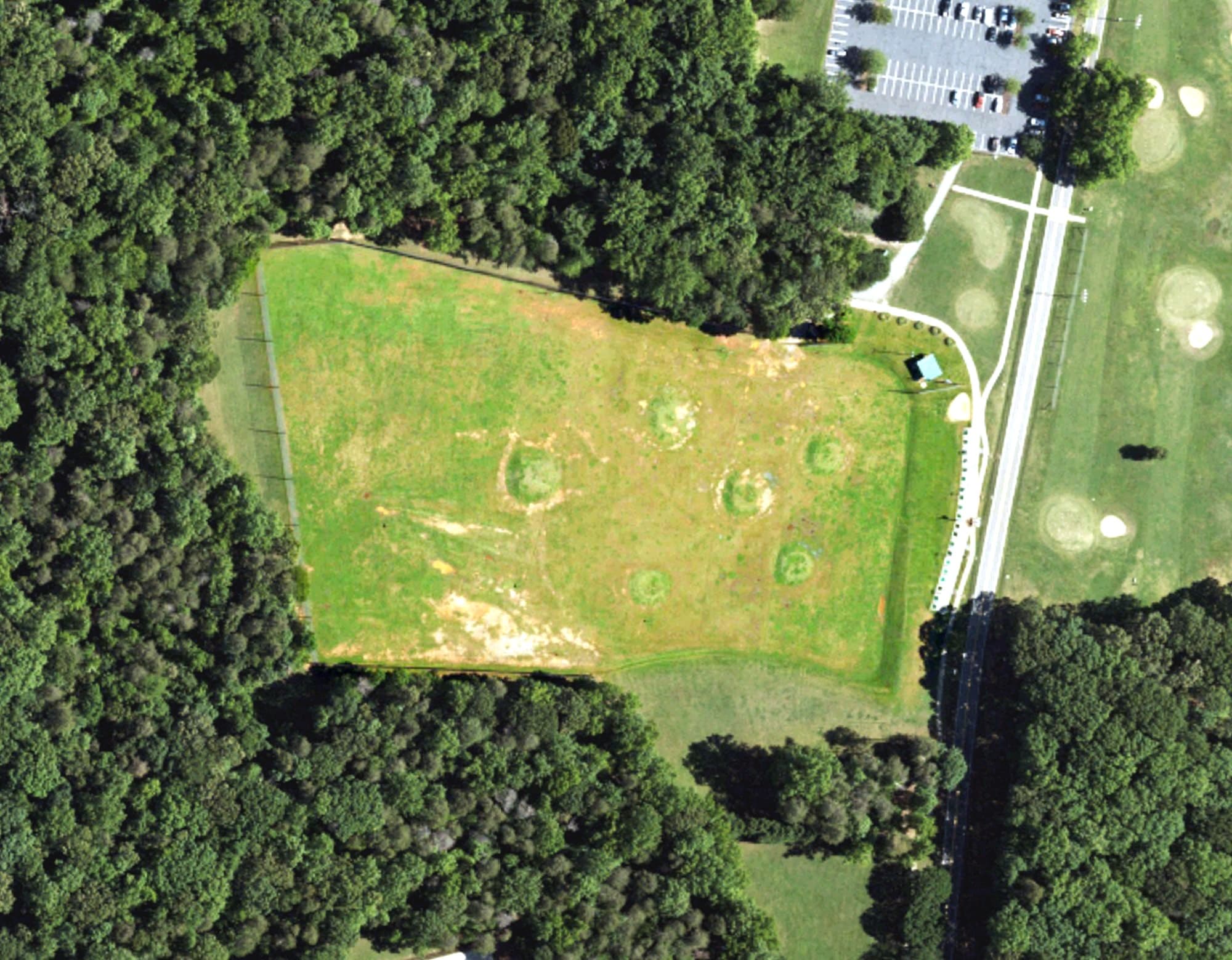Aerial view of Bur-Mil Driving Range, NC, with its hole routing marked